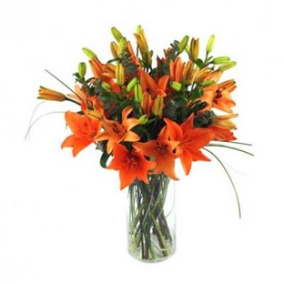 Orange Lilies in a Vase Orange Lilies in a Vase - Perfect gift that will continue to bloom for days!