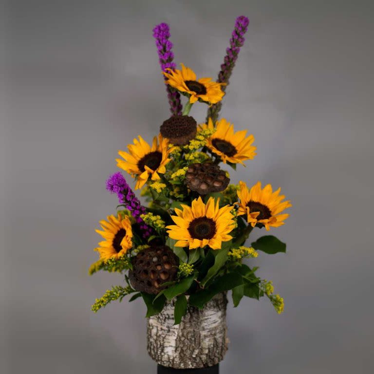 Au Naturel Au Naturel - Nature's earthy textures with a burst of sundrenched sunflowers bring a smile to everyone's face.