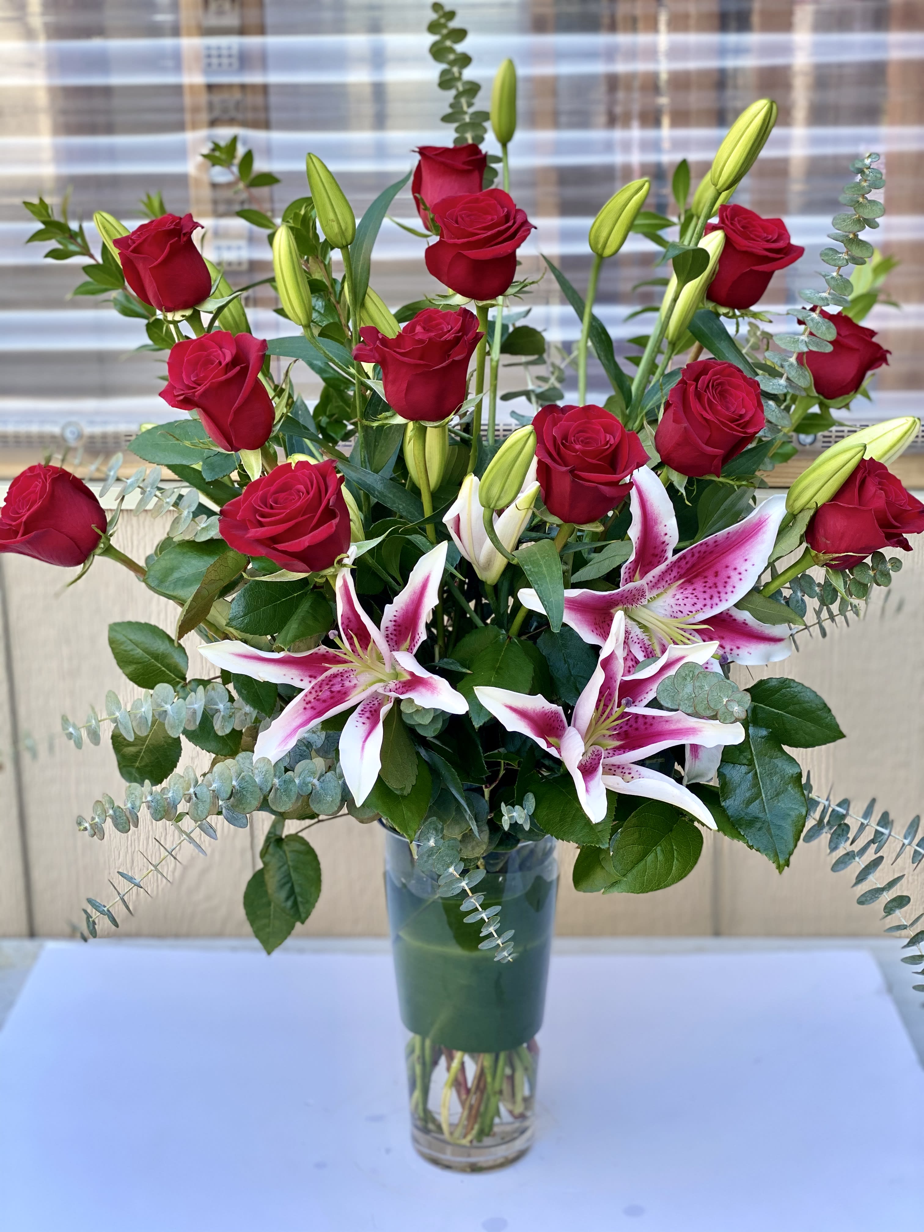 Stargazers and Red Roses Stargazers and Red Roses - All her favorites! Long-stem red Ecuadorian roses and fragrant pink stargazer lilies.