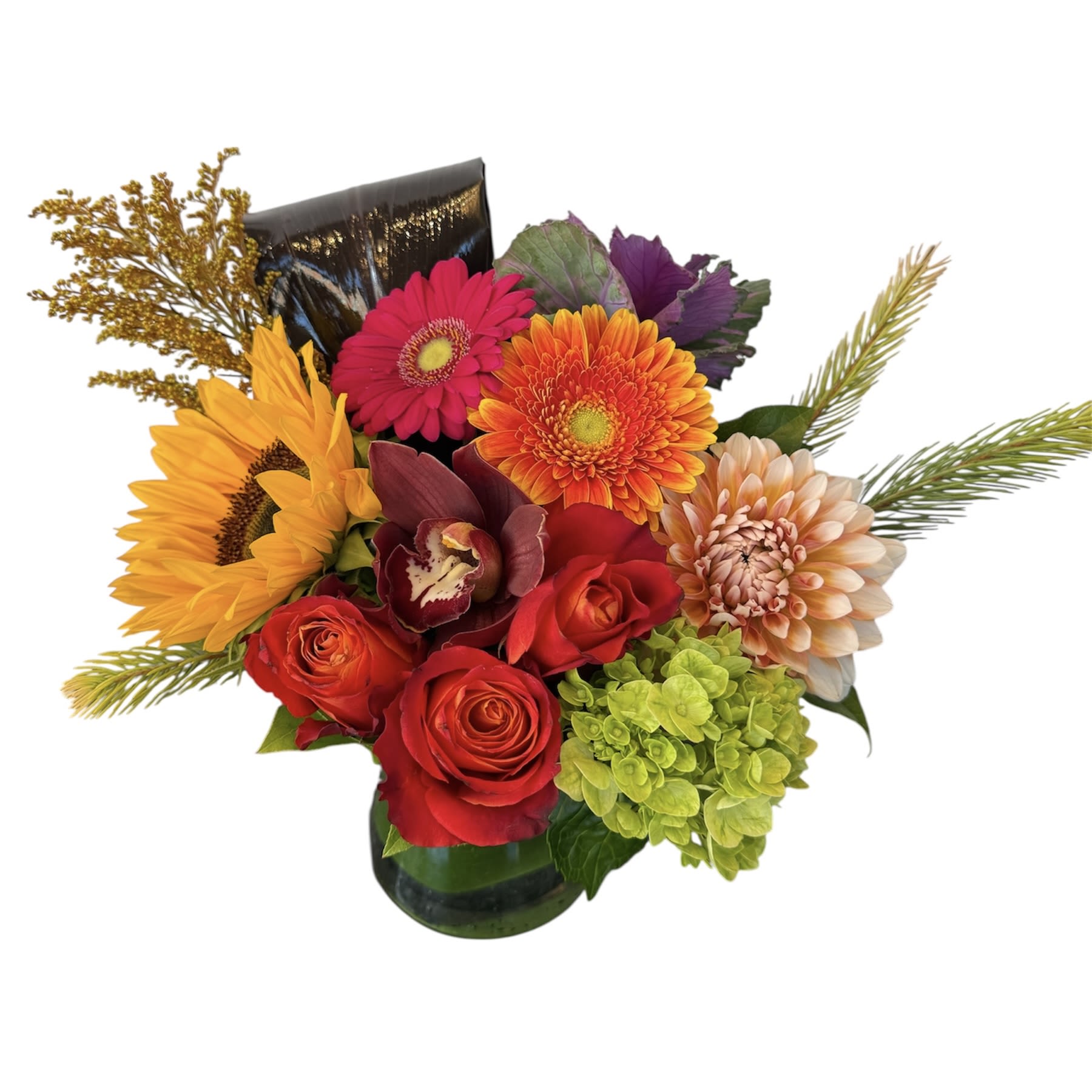 Harvest Glow Harvest Glow - Orange roses, green hydranea, dahlia, gerbera daisy, sunflower, orchid and kale designed in a glass vase. As shown in photo.