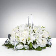 All White Floral Table Centerpiece All White Floral Table Centerpiece - We all have unanswerable questions in our lives. What’s the meaning of life? What’s the best balance of career and family? What will we have for breakfast 47 days from now? The point of life is not to answer these questions, but to enjoy the ride. This season, enjoy the present moment with this Burning Questions centerpiece.