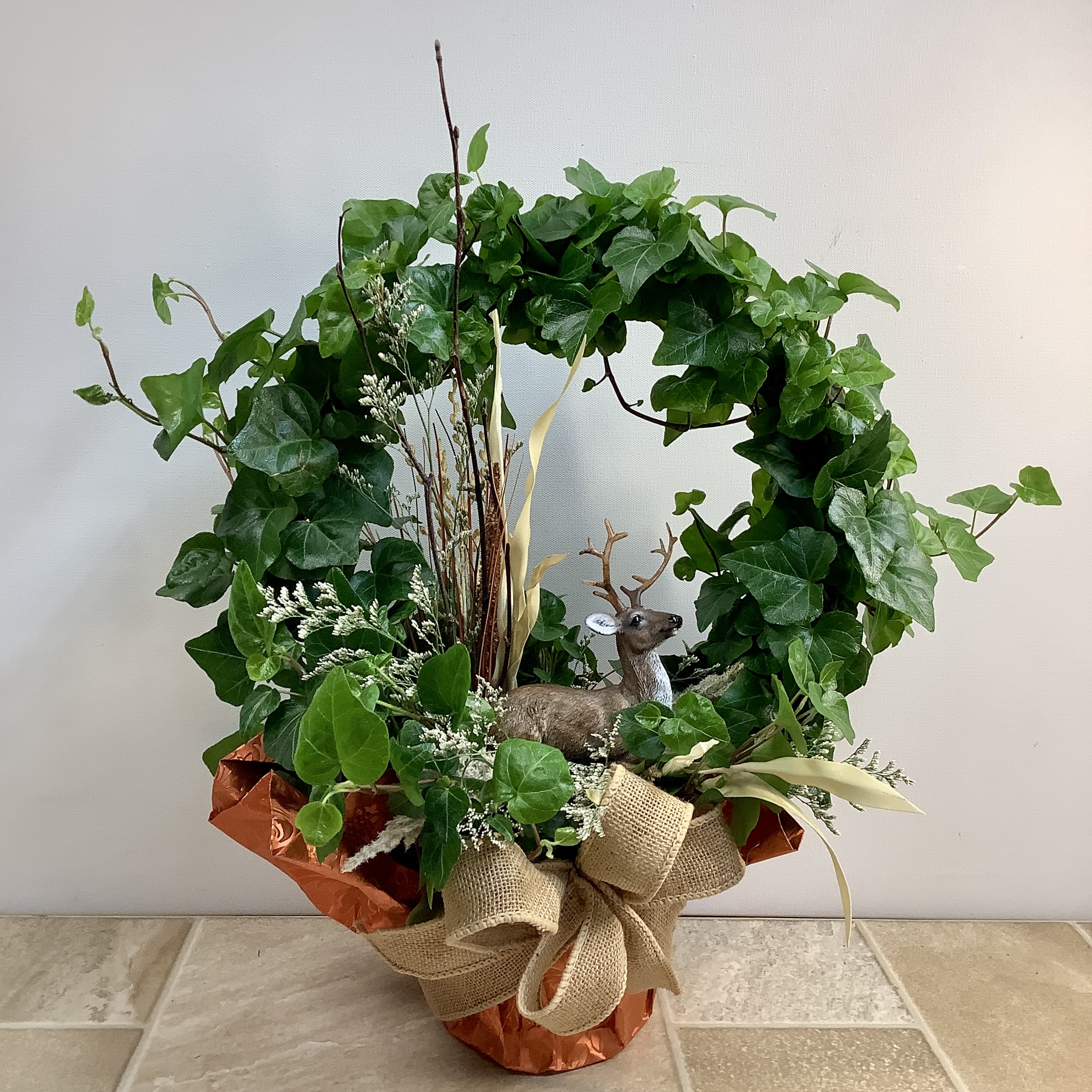 Ivy plant, Hunter’s Dream Ivy plant, Hunter’s Dream - This hoop ivy plant is surprisingly easy to grow and features dried flowers, grasses and a beautiful ceramic deer figurine. A wonderful gift for your favorite hunter or wildlife enthusiast.