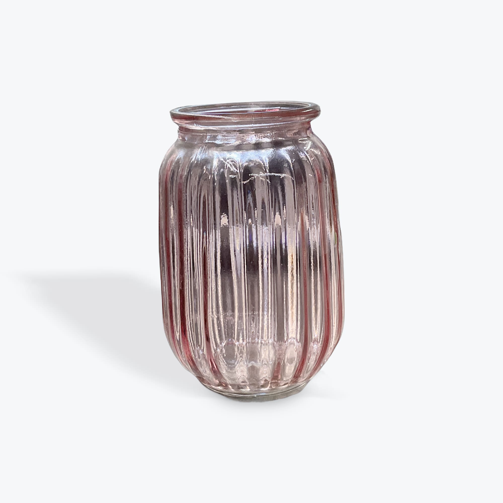 Pink Ribbed Vase Pink Ribbed Vase - Upgrade any arrangement $75 and up with this Pink Ribbed Vase.