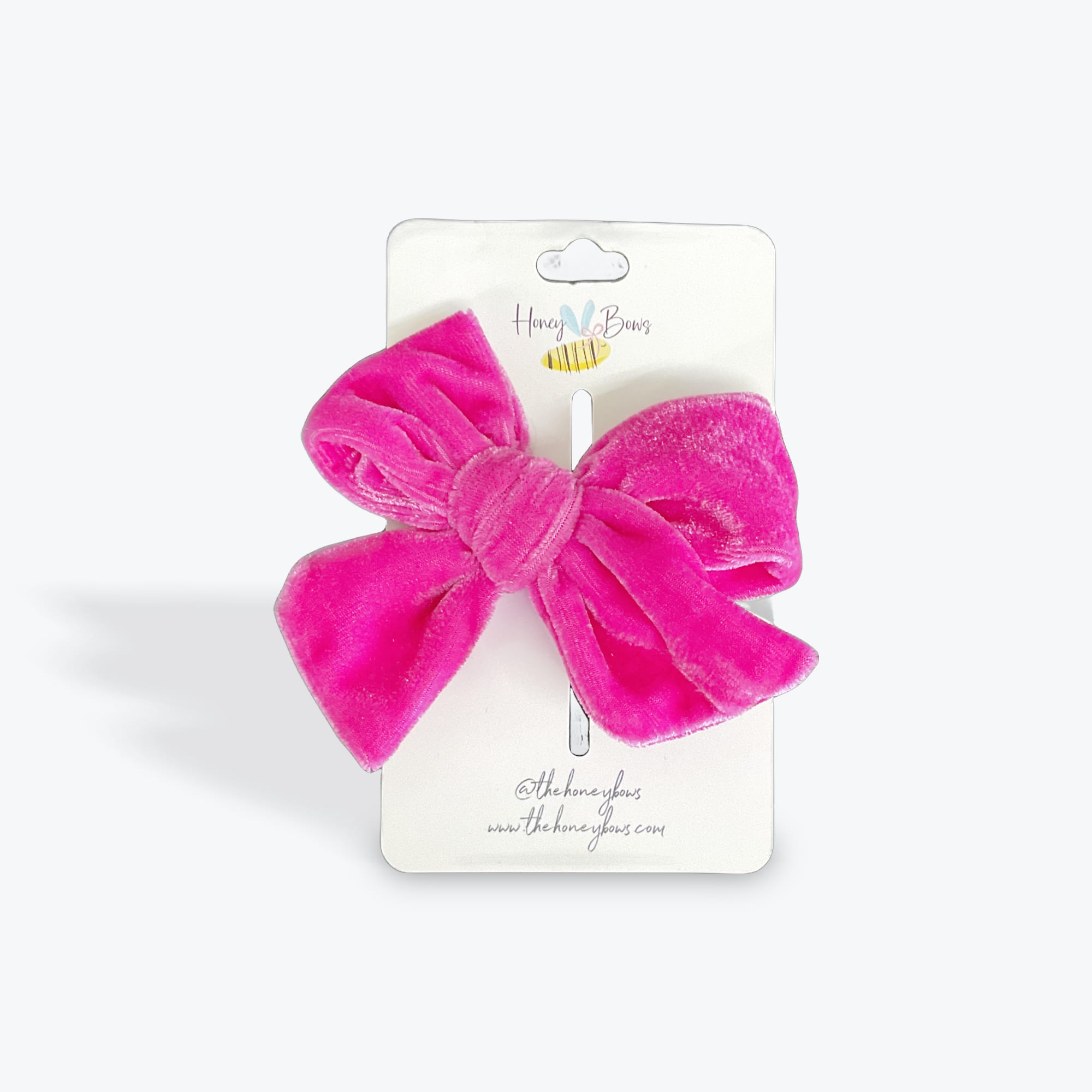 Pink Velvet Bow Pink Velvet Bow - A small velvet bow from The Honeybow Colllection.