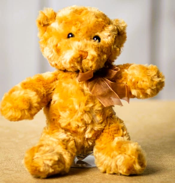 10" Beige Sitting Stuffed Bear (LOCAL PICK UP AND DELIVERY ONLY) 10" Beige Sitting Stuffed Bear (LOCAL PICK UP AND DELIVERY ONLY) - Beige Sitting Bear is 10" while standing, from head to toe and has a cute joyful face, with soft plushy fur, soft and cuddly, stuffed with hypoallergenic fiber fill.