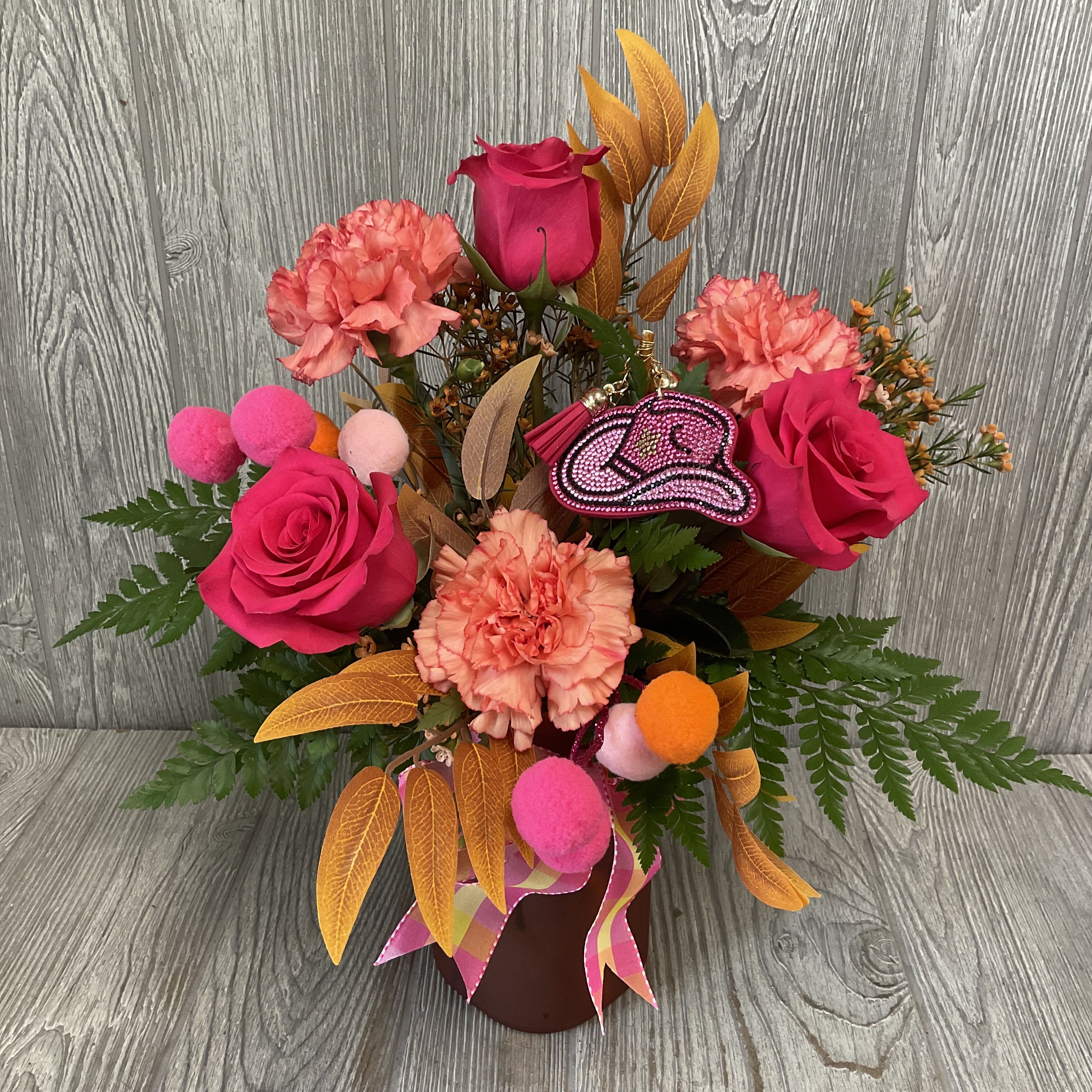 Giddy-Up, Gorgeous Giddy-Up, Gorgeous - Yeehaw! This arrangement of fresh cut flowers is perfect for the cowgirl in your life! Includes a rhinestone pink cowgirl hat keychain. Flowers and colors may vary.