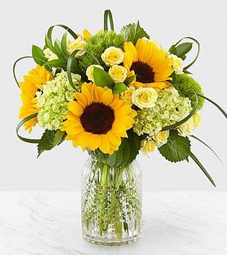 Sunflower Dreams Sunflower Dreams - Sunflowers will brighten your day, accented with hydangea, button poms and greenery makes the perfect gift!