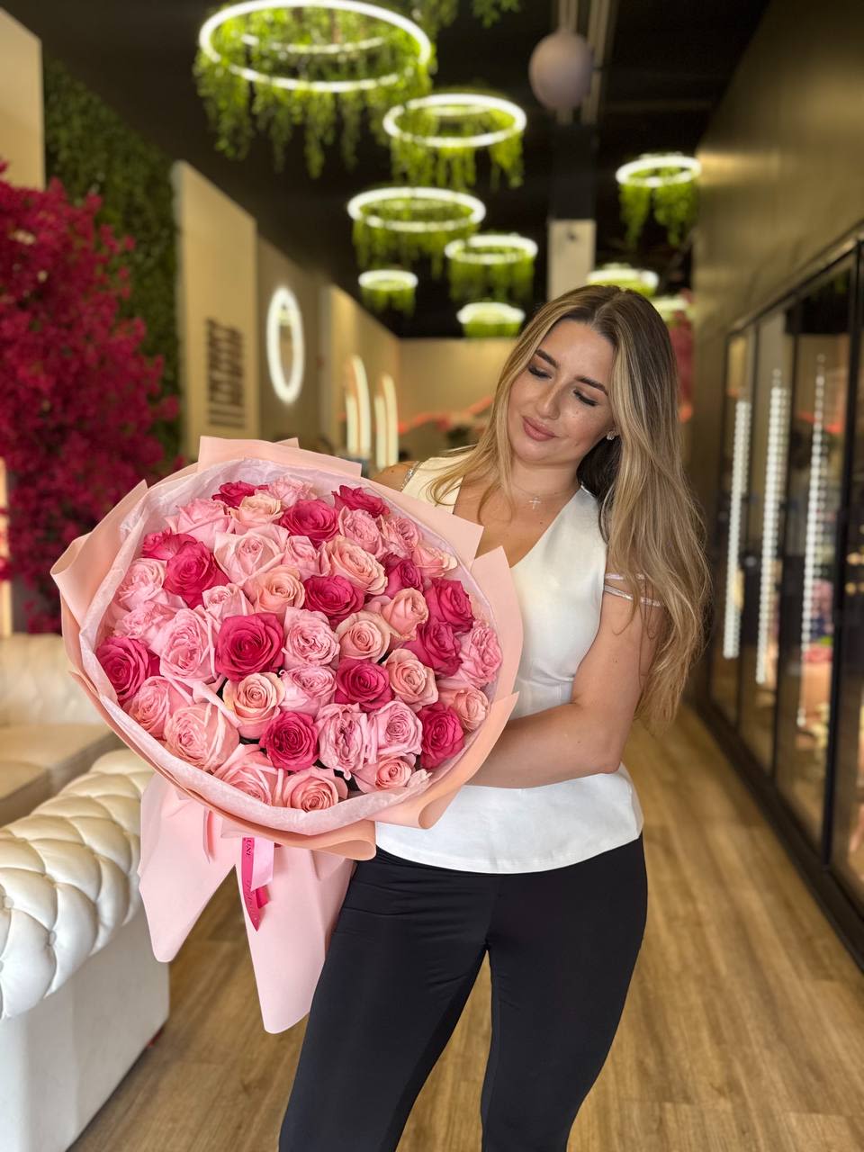 Love in Petals - 45 stem roses Mixed  pink arrangement Will be delivered as pictured 