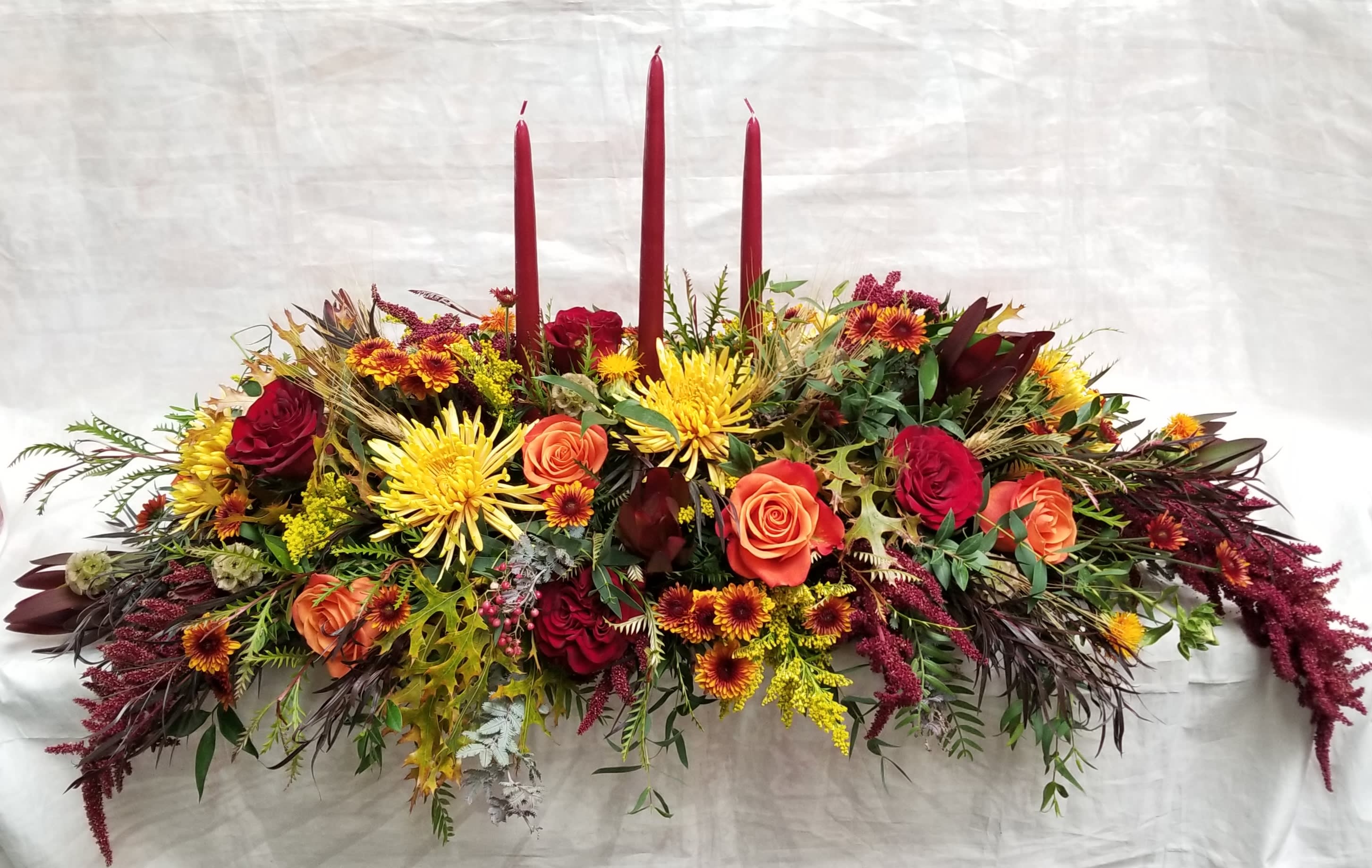 Autumn Extravagance Autumn Extravagance - Select this richly colored and extravagant 3 foot long centpiece that is perfect for any holiday table.