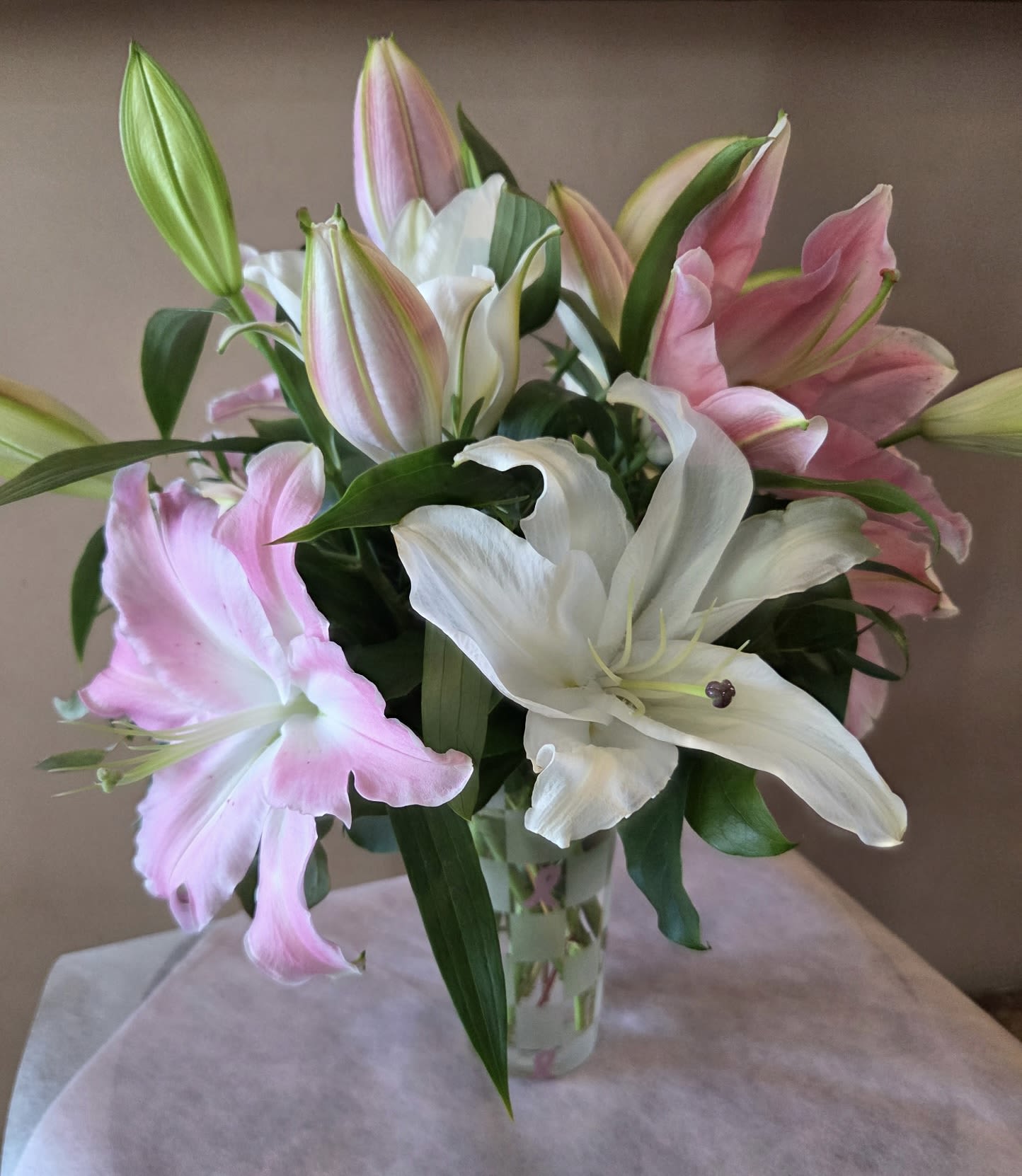 Lilies of Hope  - This all-lily arrangement, is a cheerful nod to Breast Cancer Awareness Month- because hope is always in season. 