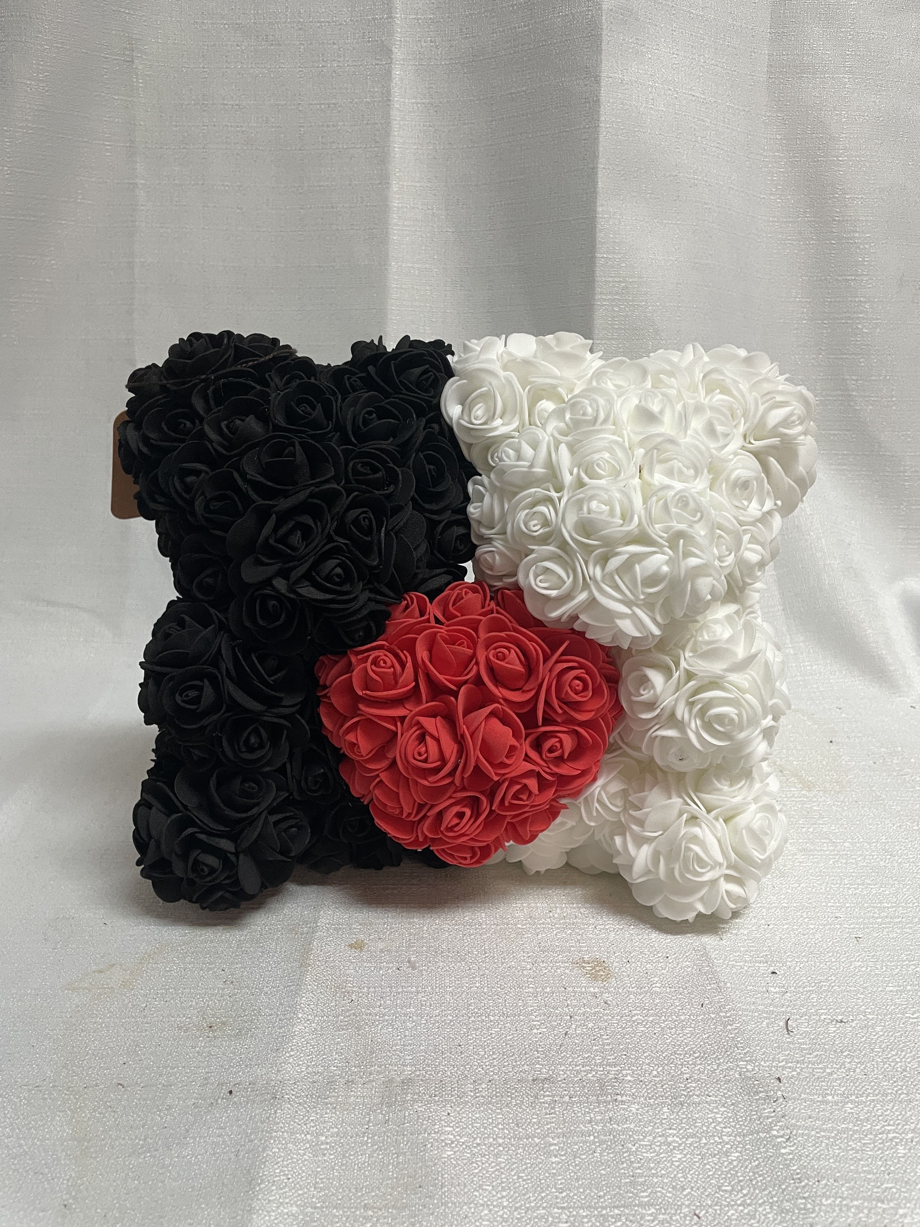 Sweetheart Double Faux Rose Bear Black and White Sweetheart Double Faux Rose Bear Black and White - Double faux rose bear with one white, one black, and a red heart in the center.