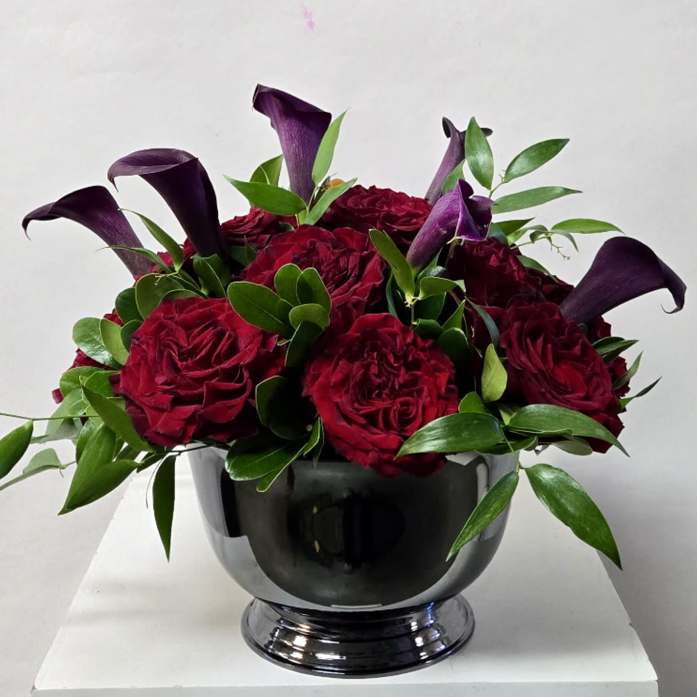 *Closeout Special* Red Rose and Calla Lily Centerpiece - Originally a $139.99 value discounted to $34.99!!Over $100 Savings!! No Quality Guarantee. No return or exchanges. Limited Stock Available!