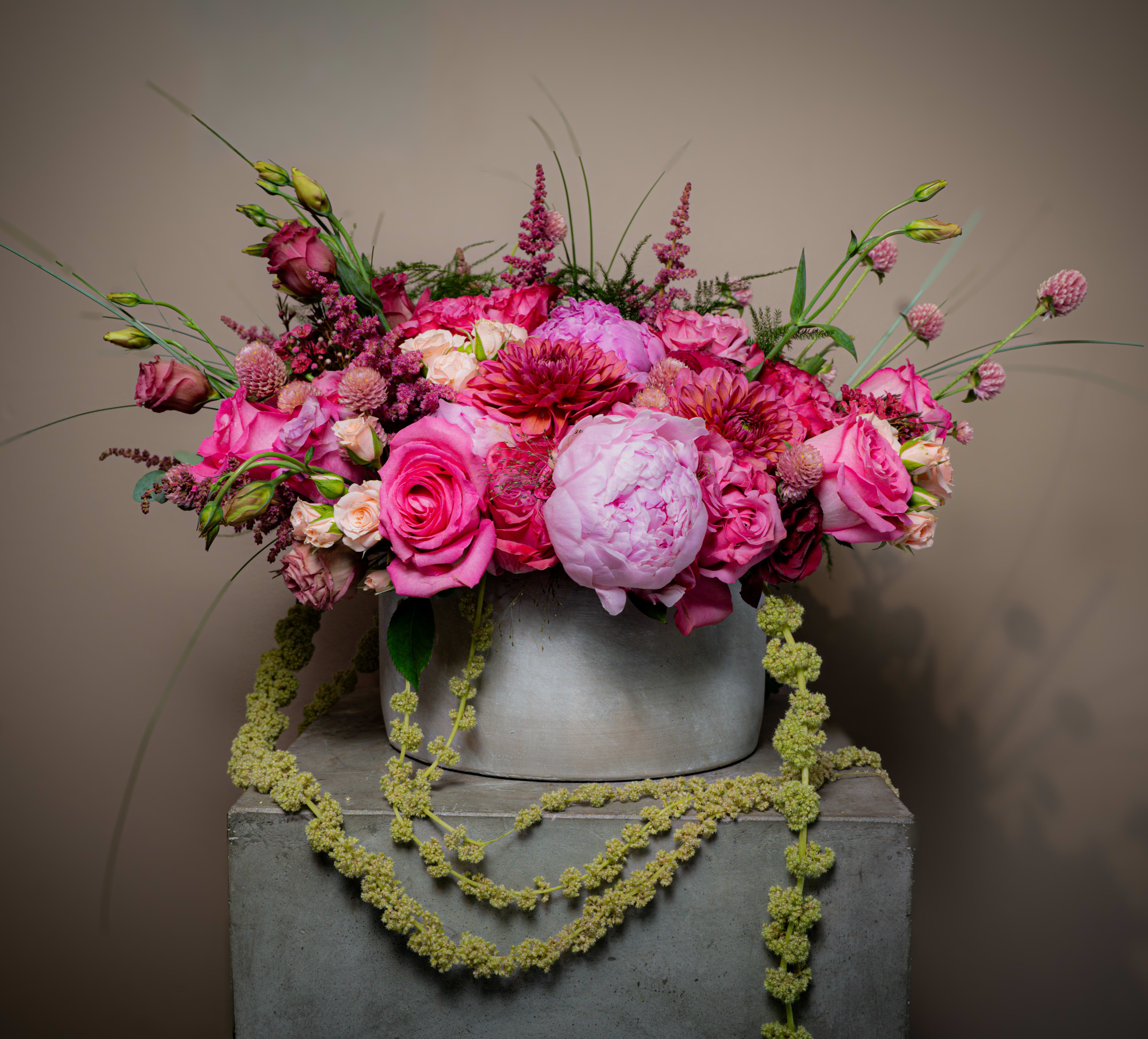 Bellezza Rosa - Send a powerful message to someone in your life who needs to be reminded how special they are. Impressive peonies, roses, and veronica, all framed with dramatic amaranthus, all come together for this beautifully dramatic arrangement. Perfect for the person who needs to be reminded just how important they are.