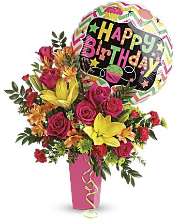 Its a Birthday Bash Its a Birthday Bash - The Perfect Birthday Surprise When it comes to celebrating a birthday, nothing adds a touch of joy and surprise quite like a delivery of vibrant flowers. Imagine the delight on the birthday person's face as they receive a festive bouquet of radiant blooms, perfectly arranged to convey your warm wishes. This celebratory arrangement includes hot pink roses, yellow Asiatic lilies, orange alstroemeria, red miniature carnations, green button spray chrysanthemums, huckleberry, and oregonia. Delivered in a raspberry tapered vase. Approximately 20 1/2" W x 25 1/2" HI The scale of the arrangement should determine the type of substitution acceptable, but the substitution must be of equal or greater value and must maintain the style and color harmony of the original order.