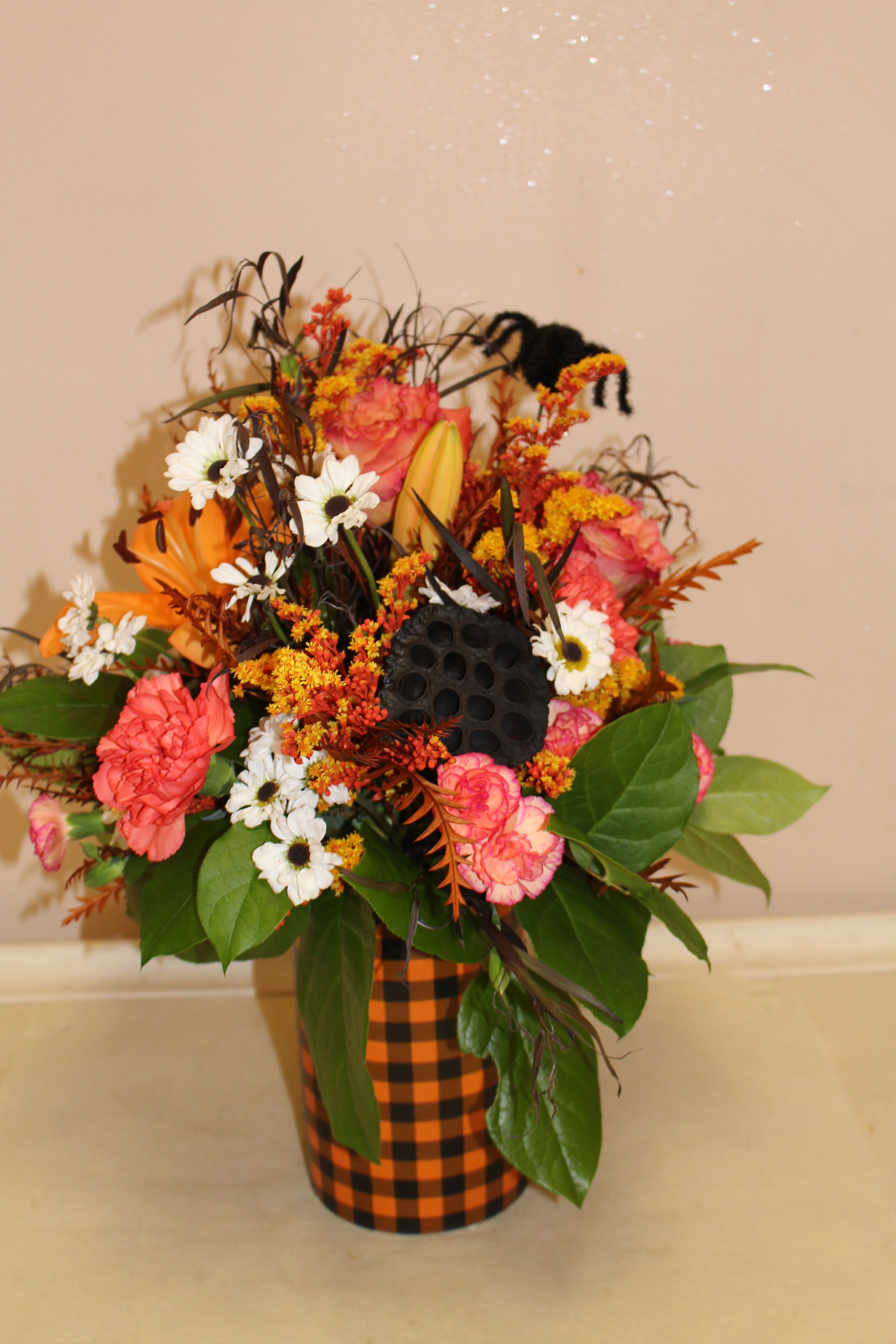 check out Halloween - spooky arrangement in orange and black checked arrangement