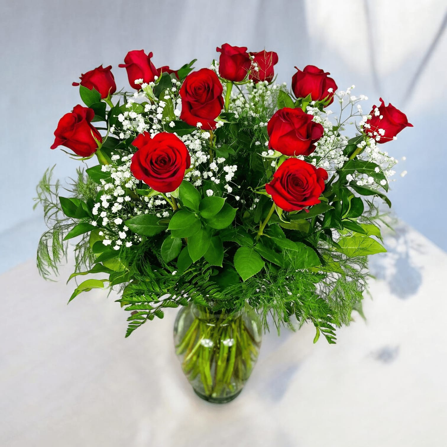 Beautiful Red Roses Bouquet - Premium Long Stem Rose - This vase of premium long stem brilliant red roses is an elegant and natural way to say, &quot;I love you.&quot;&nbsp;For the perfect, traditional Valentine’s Day bouquet – or for a birthday, anniversary or other special day –&nbsp;this beautiful red roses bouquet of a dozen red roses, adorned with a classic mix of white baby’s breath and ferns, is a classic gift of love. Let DGM Flowers deliver a beautiful surprise for you today!