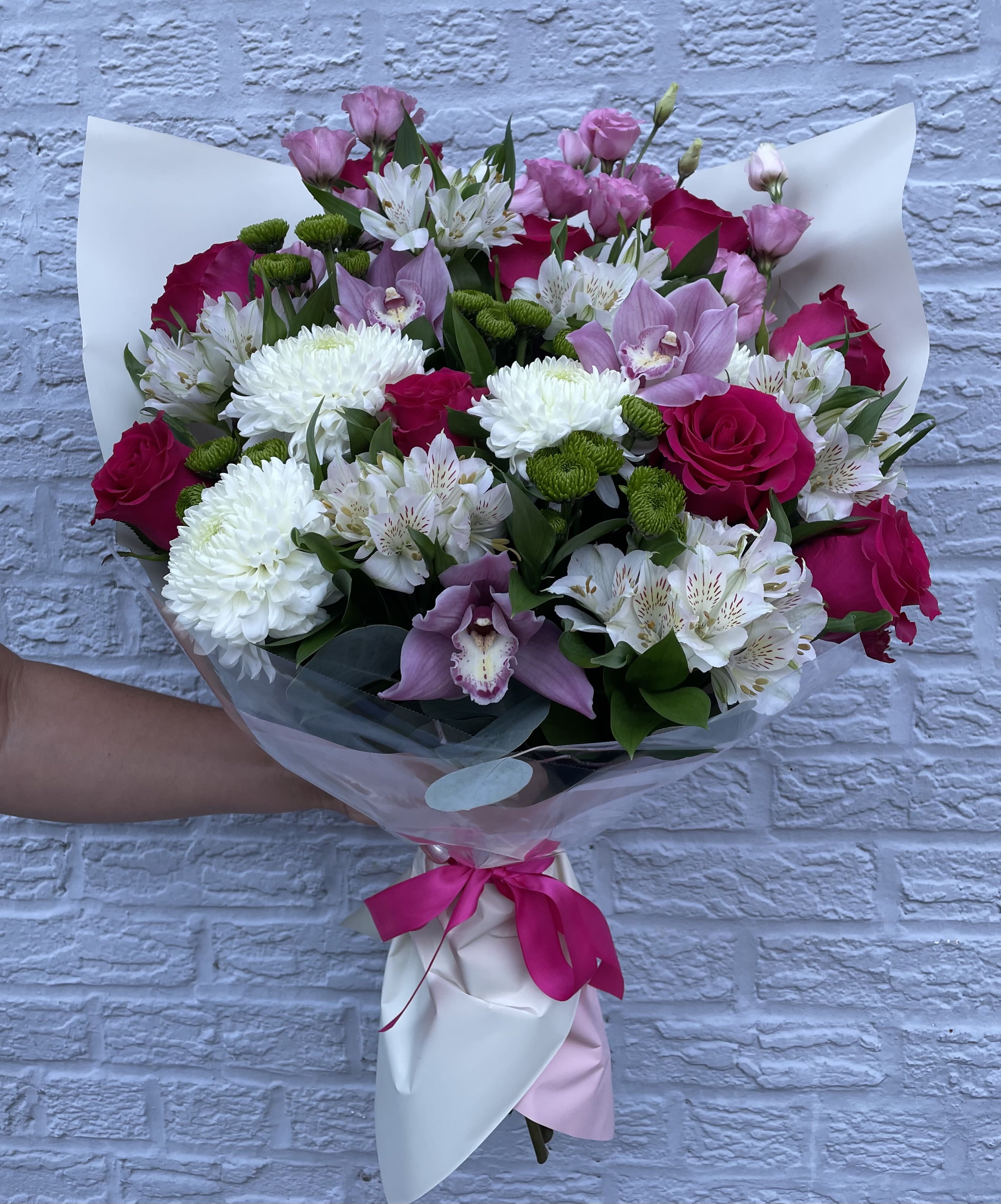Beautiful Bouquet for All Occasions - Please call (347) 492 - 5777 for variations and options. Available any size any price any flowers and can be done as a hand rapped bouquet or basket.
