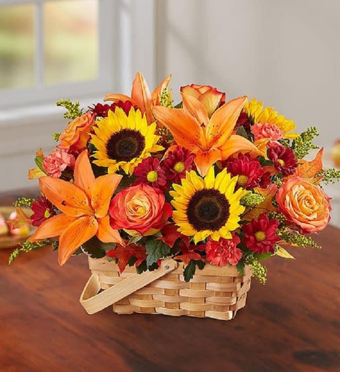 Fall Basket Centerpiece Fall Basket Centerpiece - nspired by the rustic beauty of the European countryside, our best-selling autumn bouquet is designed with fresh-picked flowers in a charming basket. Shades of golden yellow, warm orange and pops of rich red create a vibrant gift that lets them know they’re on your mind.