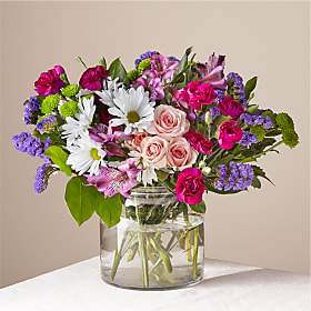 Wild Berry Bouquet Wild Berry Bouquet - The best things in life are sweet, vibrant and blooming with freshness. Our Wild Berry Bouquet embodies all that and more with its rich blend of white, pink and purple florals to create the perfect impression.