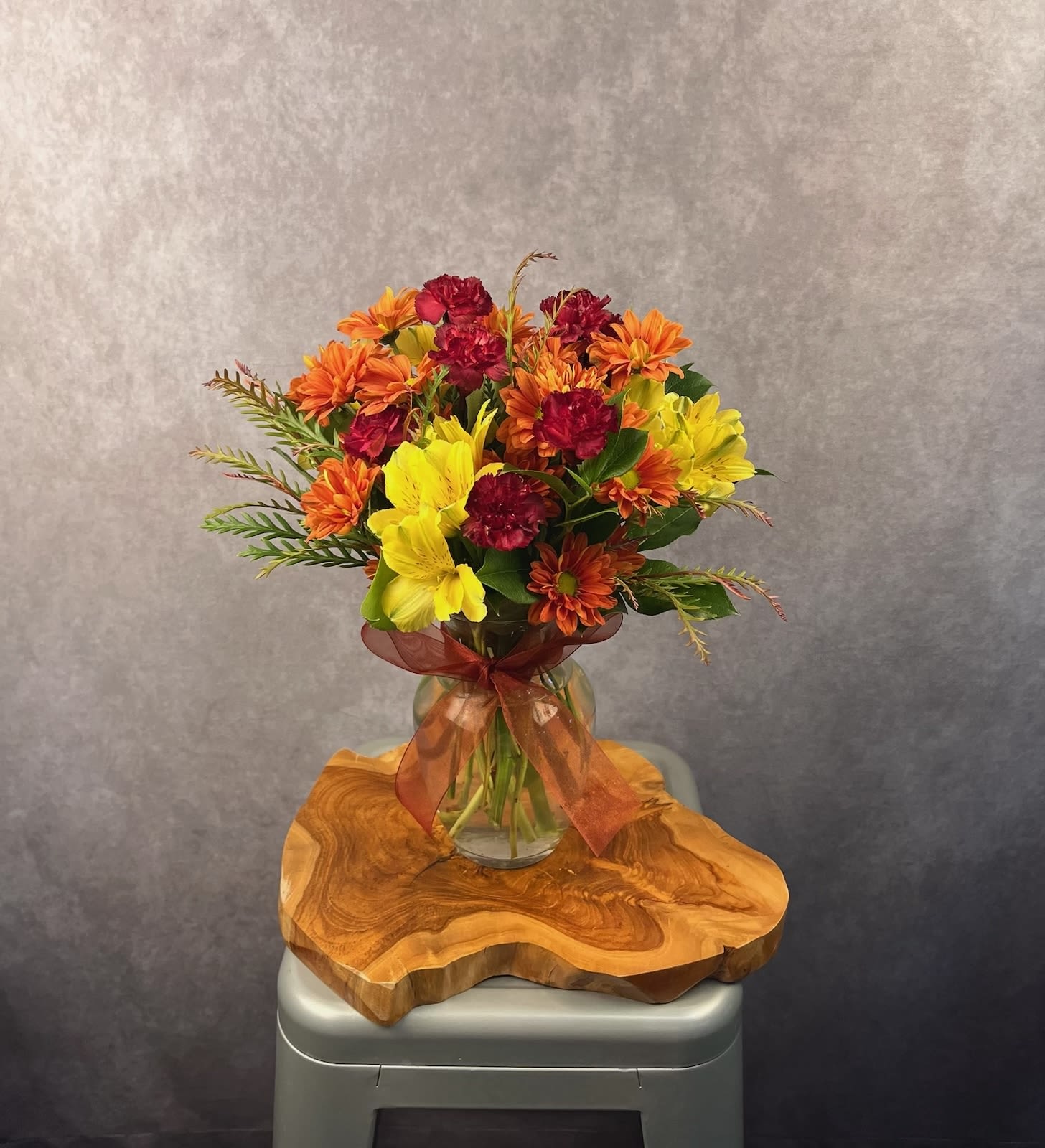 My Autumn Sweetheart My Autumn Sweetheart - A small bouquet that that is big on fall colors! Includes daisies, pixie carnations, and alstroemeria. **** The colors of the flowers may need to be substituted depending on availability. The autumn vibe will be maintained. Please Note: Standard Delivery for this product occurs in the afternoon, between 2:30pm and 7pm. If you need it by a certain time, there is an option to select a timed window for scheduled deliveries.