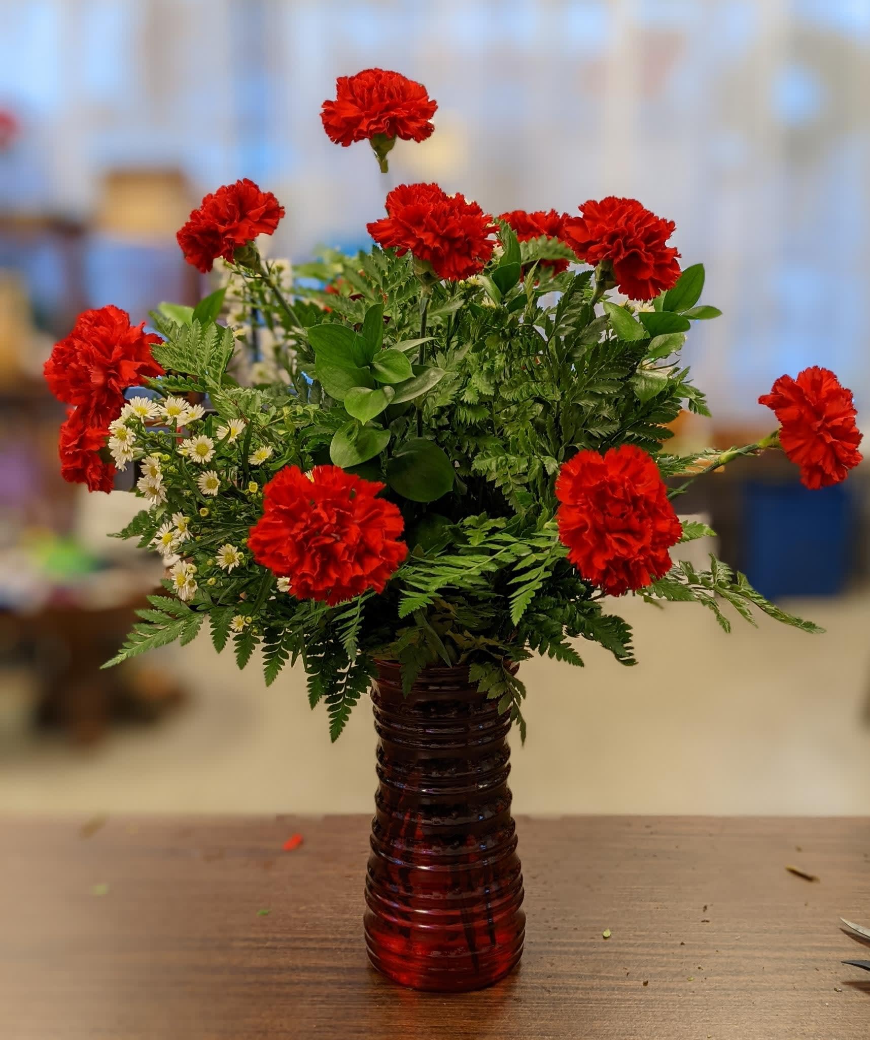 Carnation Extravagance - Red Carnations for a similar look and feel to Rose Excellence  but for the cost conscious consumer. 