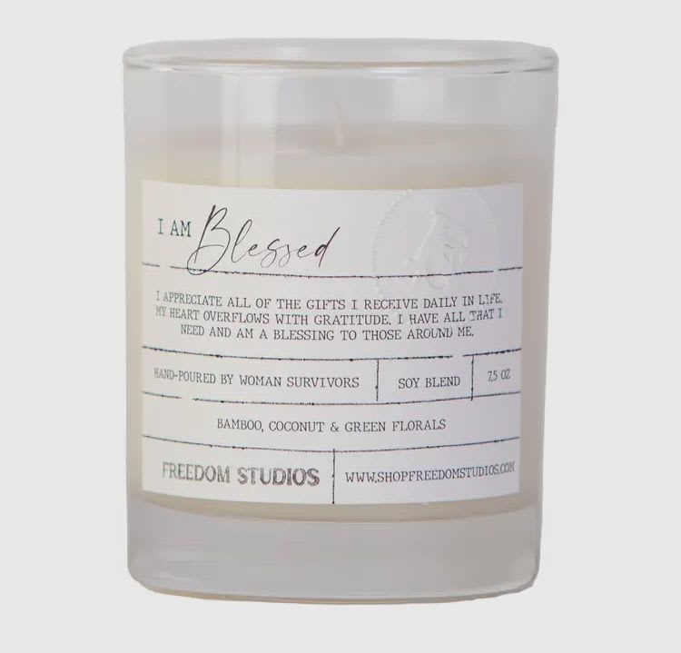 I AM Blessed -  Description  Light a candle and count your blessings with vibrant notes of bamboo, coconut &amp; green florals.  This 7.5 oz handcrafted concrete candle is made with soy blend wax and clean-burning cotton wicks and is hand-poured by women survivors.  I AM Blessed &quot;I appreciate all of the gifts I receive daily in life. My heart overflows with gratitude. I have all that I need and am a blessing to those around me.&quot;