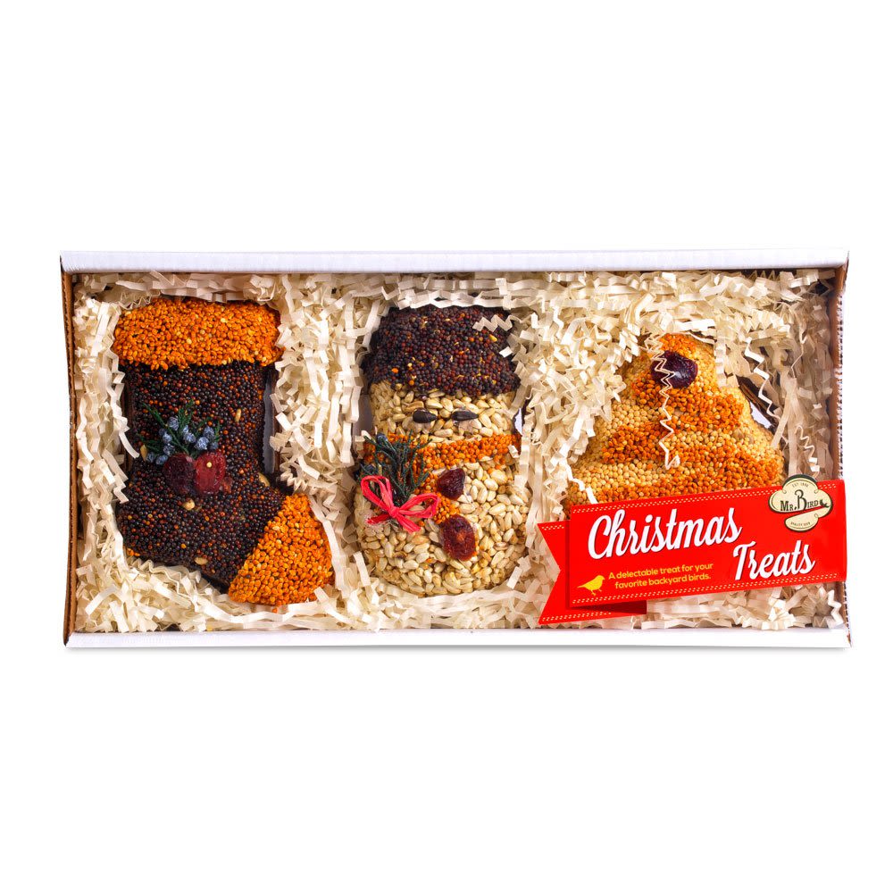 Mr. Bird Christmas Treats (3pk) Mr. Bird Christmas Treats (3pk) - Fantastic trio of 4″ solid seed ornaments includes a tree, snowman, and stocking…decorated with juniper and cranberries. The birds eat them all! All feature natural jute hangers and are presented in a display box for easy merchandising and wrapping. A delightful treat for your favorite backyard birds and a thoughtful gift for any bird-lover. The perfect stocking stuffer.