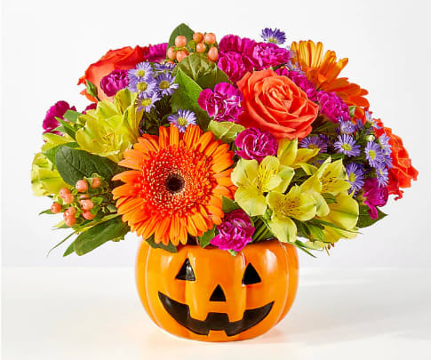 Tricks and Treats Bouquet Tricks and Treats Bouquet - Full of colorful blooms, this jack-o’-lantern is sure to delight for seasonal gatherings, a birthday surprise, or a festive pick-me-up!