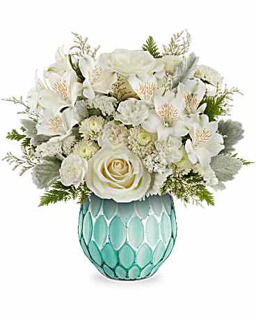 Teleflora's Chic Charm Bouquet - Elegant and stylish, this monochromatic white rose bouquet is elevated by a frosted glass vase featuring a sculpted design and a shimmering faux mercury glass finish. This bouquet showcases a beautiful all-white palette with roses, alstroemeria, miniature carnations, button spray chrysanthemums, sinuata statice, and limonium, enhanced by dusty miller and leatherleaf fern. This bouquet is elegantly arranged in the Dream In Color vase, creating a striking addition to any home dÃ©cor.
