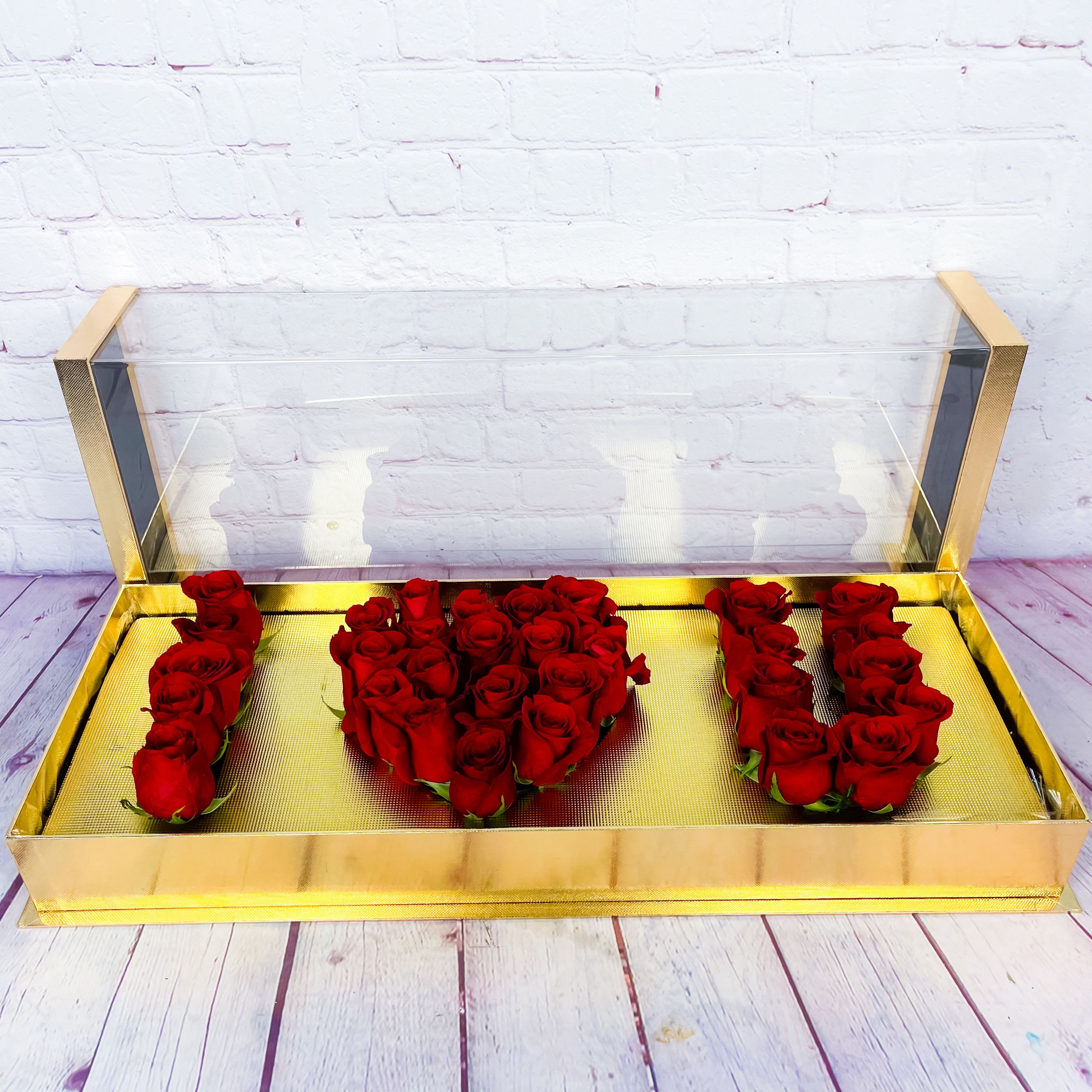 Deep Love Fresh Rose - I Love You Flower Box (GOLD) Deep Love Fresh Rose - I Love You Flower Box (GOLD) - This elegant flower box features fresh cut roses, symbolizing love and affection. Perfect for expressing your deepest emotions, this exquisite gift is perfect for birthdays, anniversaries, or any special occasion. The Deep Love Flower Box exudes elegance and sophistication, making it a unique and memorable gift for your loved ones. Show just how deep your love goes with our exclusive Deep Love Deep Love Fresh Rose "i love you rose box" Luxe Box of Premium Fresh Red Freedom Rose. Your incredible, grand gift will stop your love in their tracks!