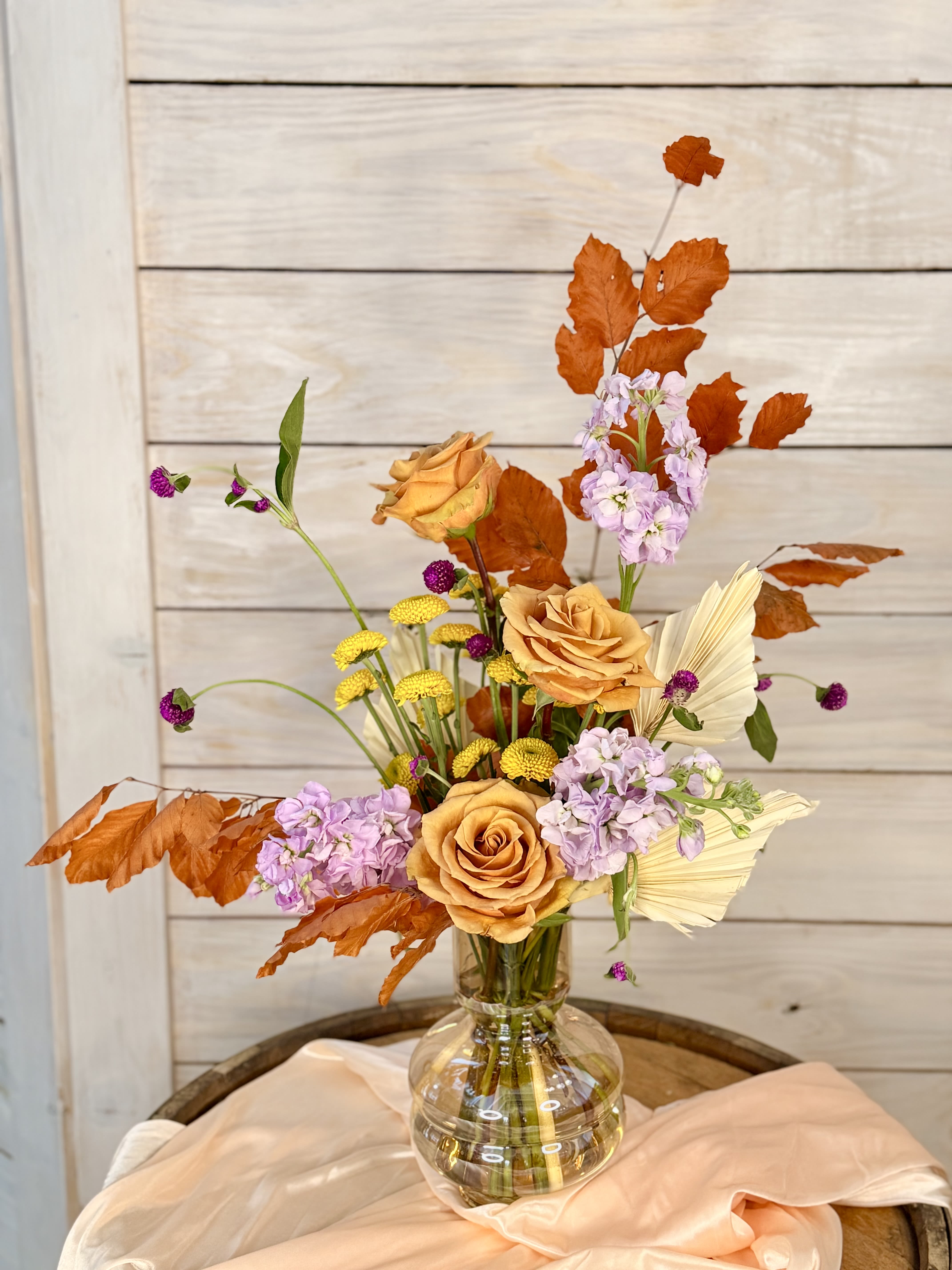 Golden Hour Glow ***Limited Design*** - With warm golden roses, amber accents, and fuchsia blooms - this is the moment when summer says goodbye! Limited edition &quot;Genie&quot; vase. Only 4 available. Get it before it's gone!
