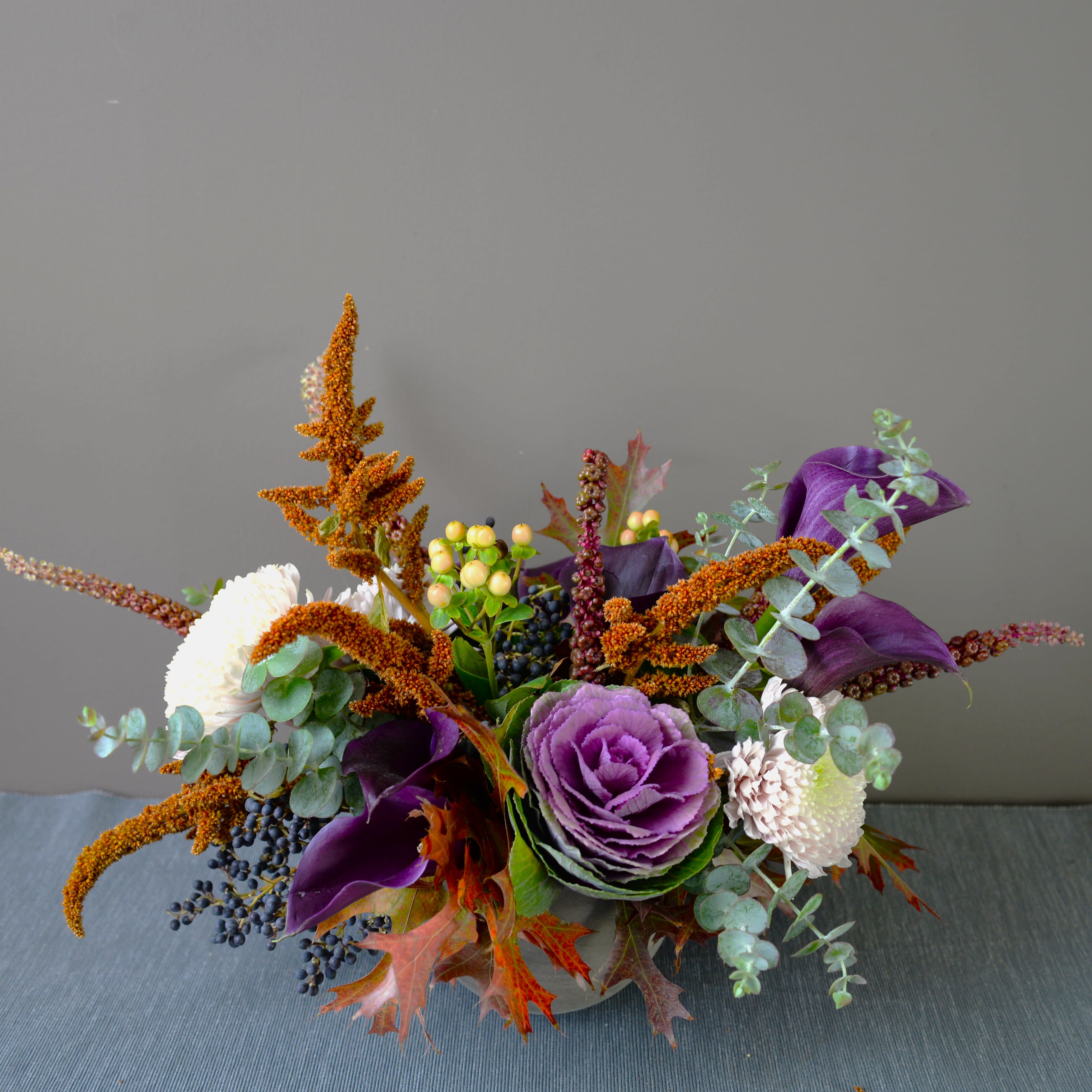 Seasonal Treasures Colorful Seasonal Treasures Colorful - We will select the most beautiful seasonal blooms, texture and greenery to create a colorful arrangement. The arrangement can be any color scheme as we are following the seasons and what's available in the market. This size is perfect for a dining table for 4-6 guests or a larger coffee table.