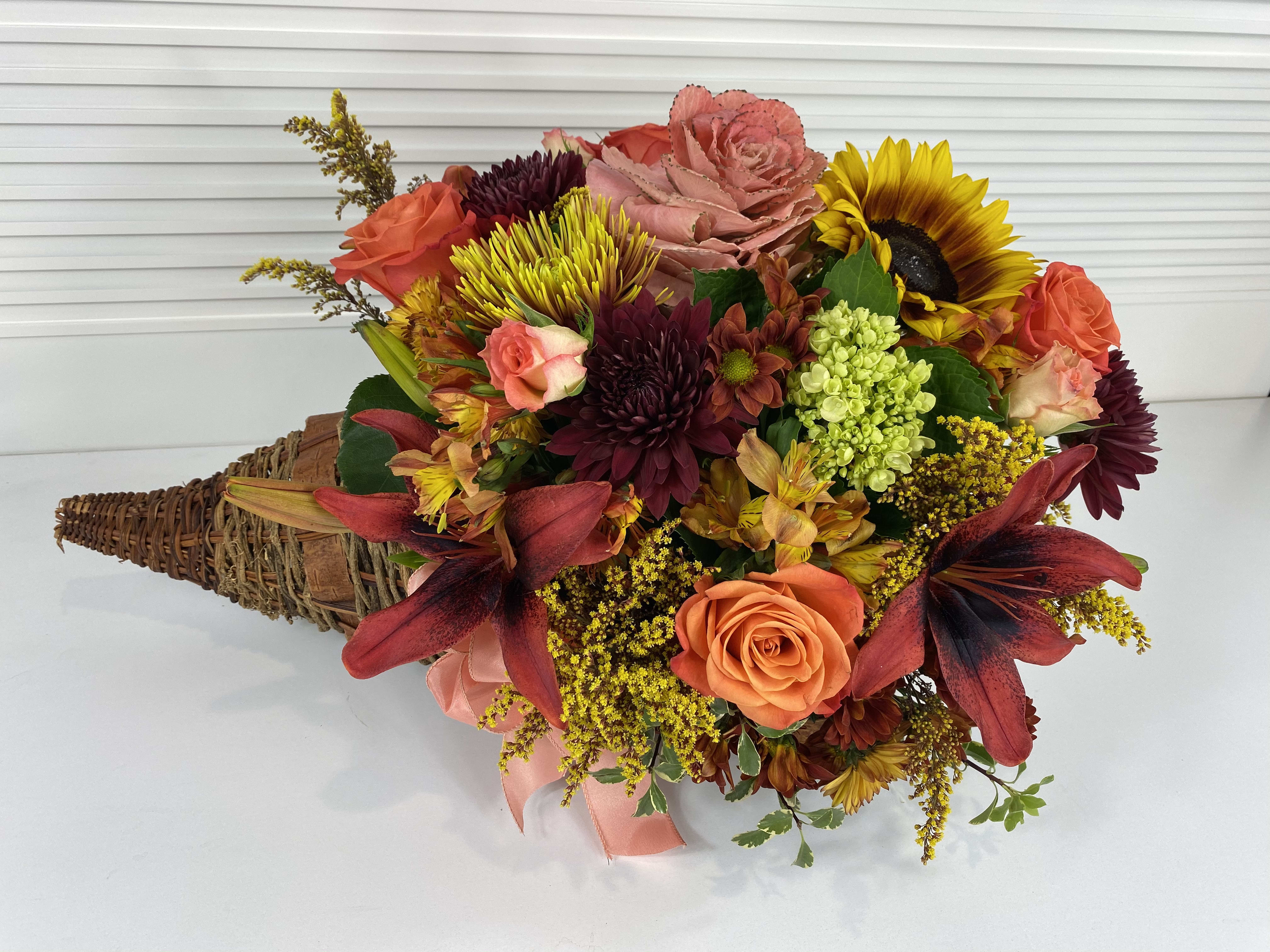 Cornucopia  - Rich Fall Cornucopia arrangement .
