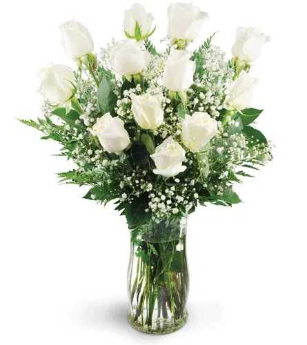 Dozen White Roses Dozen White Roses - A symbol of young love and loyalty, white roses are a timeless token of affection. A simple and elegant way to celebrate love—from anniversaries and weddings to birthdays and congratulations. The perfect gift for the sweetest moments. A dozen white roses are beautifully arranged with soft baby's breath and lush greenery.