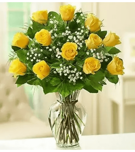 Dozen Yellow Roses Dozen Yellow Roses - One dozen yellow roses arranged in a vase. Due to availability, the filler shown in the picture (babies breath) may vary.