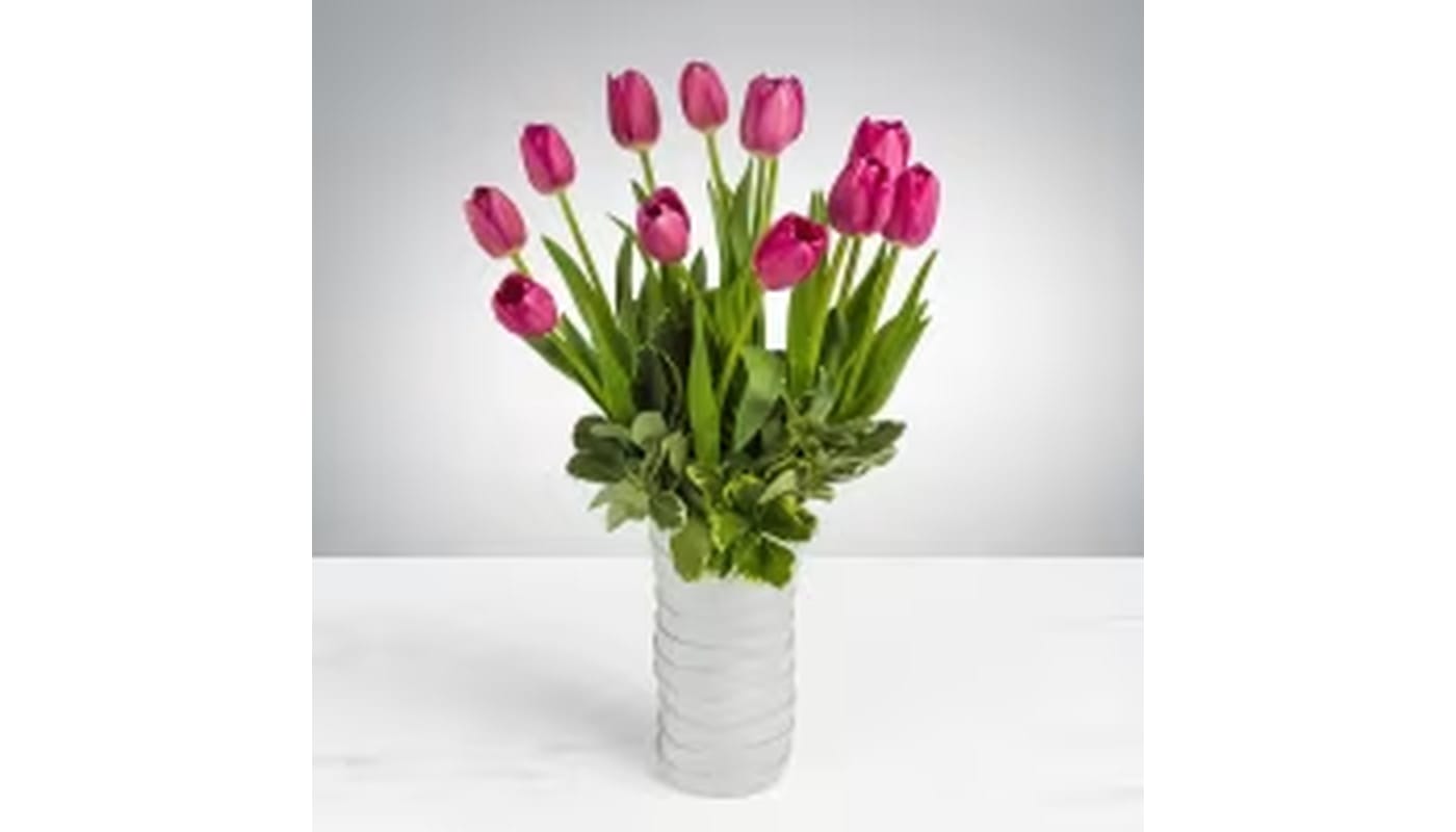 Tulip blossom 137 Tulip blossom 137 - In some instances, our photo may represent an overall theme or look and include a one-of-a-kind vase which cannot be exactly replicated. Although the actual bouquet may not precisely match the photo, its temperament will. Occasionally, substitutions of flowers and/or containers happen due to weather, seasonality and market conditions which may affect availability. If this is the case with the gift you’ve selected, we will ensure that the style, theme and color scheme of your arrangement is preserved and will only substitute items of equal value or higher value. If any design elements are of major importance to your order, please include them in the florist instructions at checkout or contact us to ensure availability. Flower Care & Guarantee Policy We guarantee the freshness of our flowers for 24 hours from the time they leave our shop. Please note that because flowers are natural products, some blooms may open fully while others may not. This is a natural variation. To help your flowers last longer: For cut flowers: Trim the stems by 1 inch every 2–3 days and place them in fresh water. For arrangements in wet foam: Add 1 cup of water to the foam every couple of days to keep the flowers hydrated. After 24 hours from leaving the shop, it becomes the customer’s responsibility to care for the flowers properly. Thank you for your understanding and for choosing our shop!