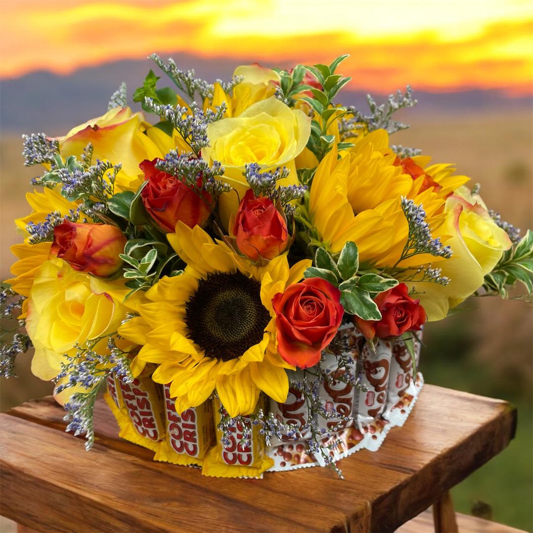 Sweeties Sunshine  - In some instances, our photo may represent an overall theme or look and include a one-of-a-kind vase which cannot be exactly replicated.  Although the actual bouquet may not precisely match the photo, its temperament will. Occasionally, substitutions of flowers and/or containers happen due to weather, seasonality and market conditions which may affect availability. If this is the case with the gift you’ve selected, we will ensure that the style, theme and color scheme of your arrangement is preserved and will only substitute items of equal value or higher value.  If any design elements are of major importance to your order, please include them in the florist instructions at checkout or contact us to ensure availability.