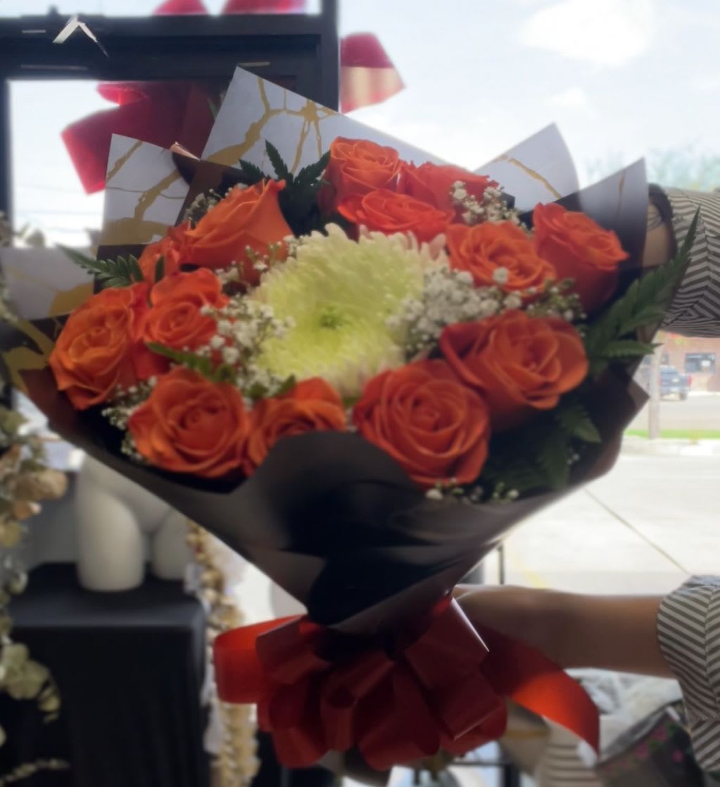 orange bouquet - a dozen orange roses with a large mum and baby breathe