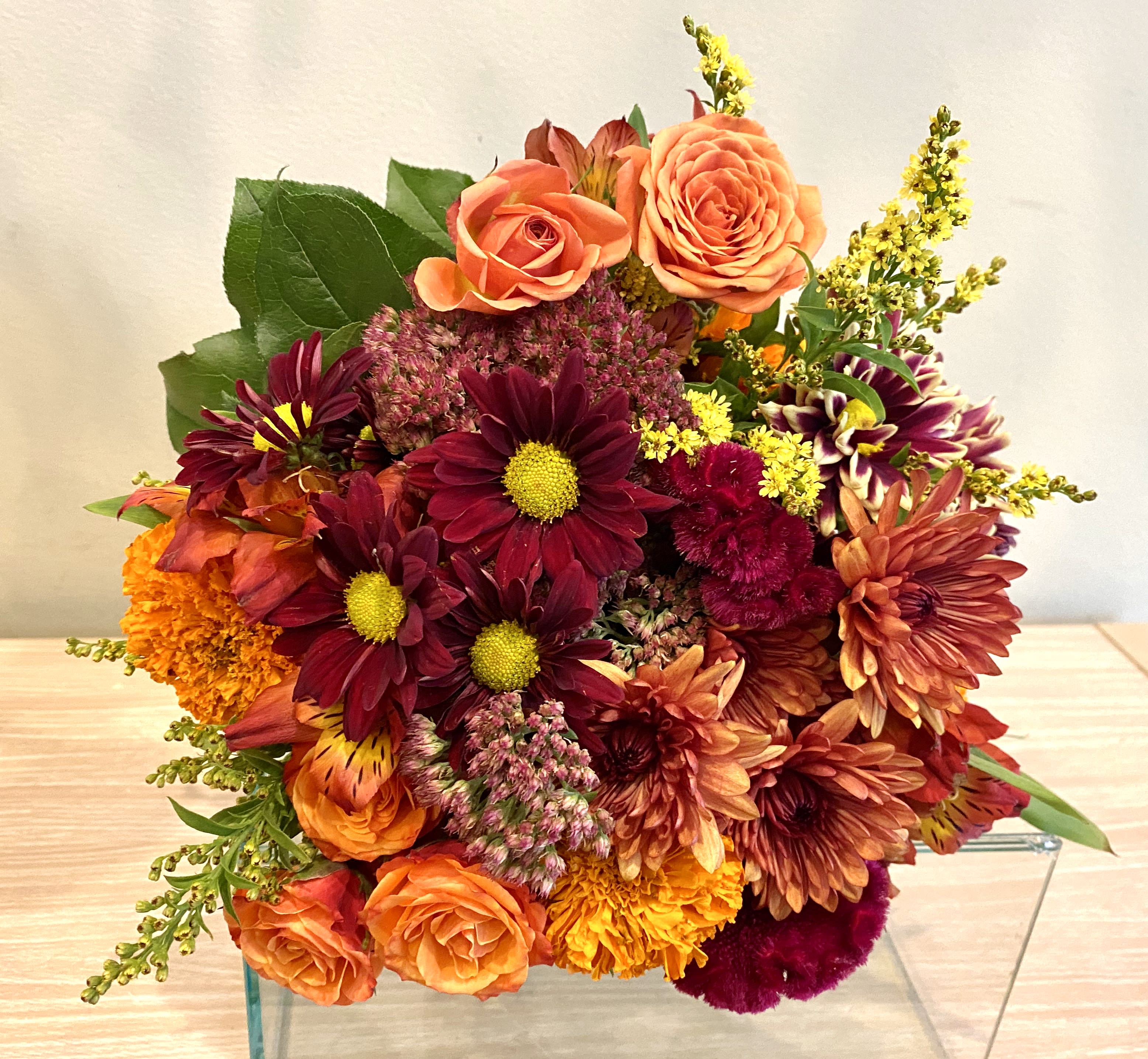 Autumn’s Best - Cut flower bouquet of seasonal fall flowers in reds, orange  &amp; gold.  (No vase)