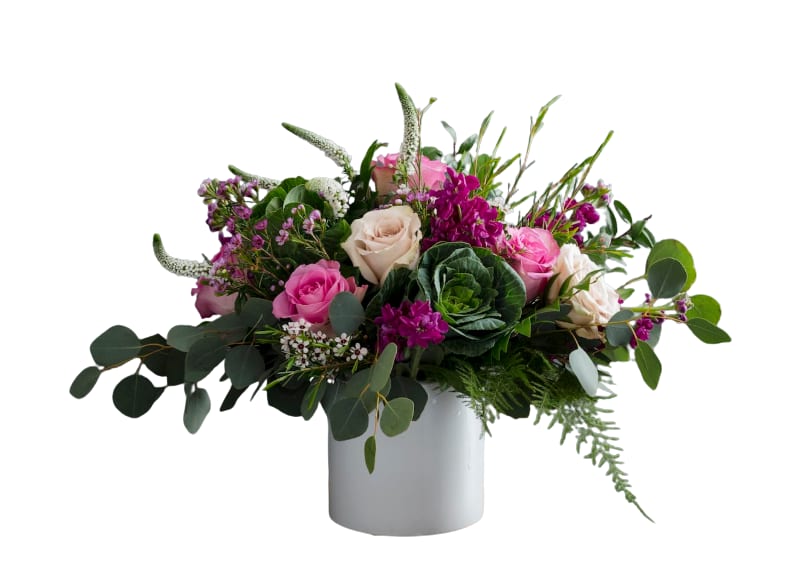 Whispering Garden - Gorgeous! Premium flower for a special person or occasion. Approximately 14&quot; high and 12&quot; wide. Roses in shades of pink and white with White Veronica creating a leggy, whimsical design. But, also, get this, ornamental Kale making this design garden fresh. A few small petal blooms add texture making this a &quot;to see&quot; design. 