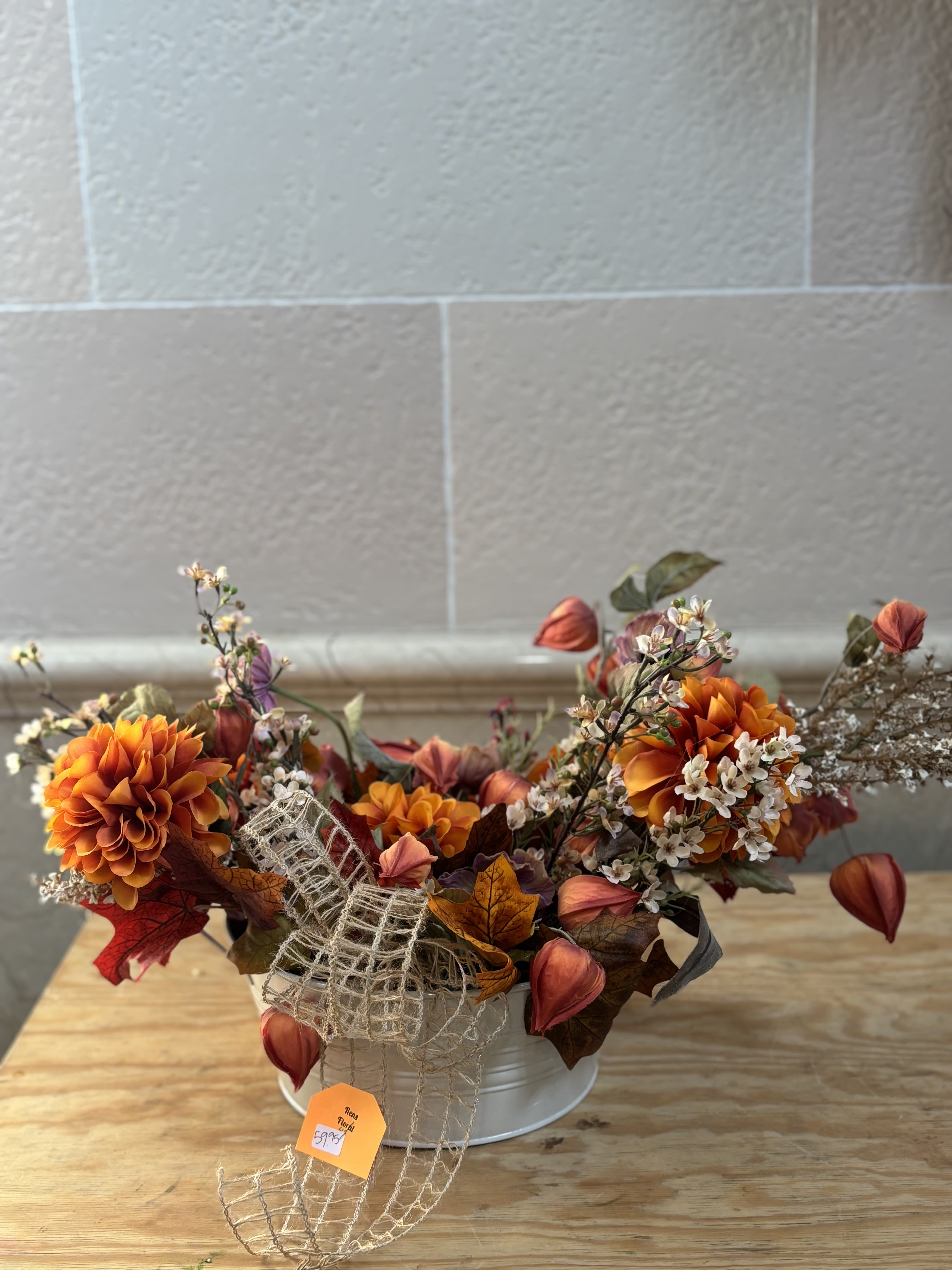 Fall Artificial Bucket  - A bucket arrangement full of artificial fall flowers. 