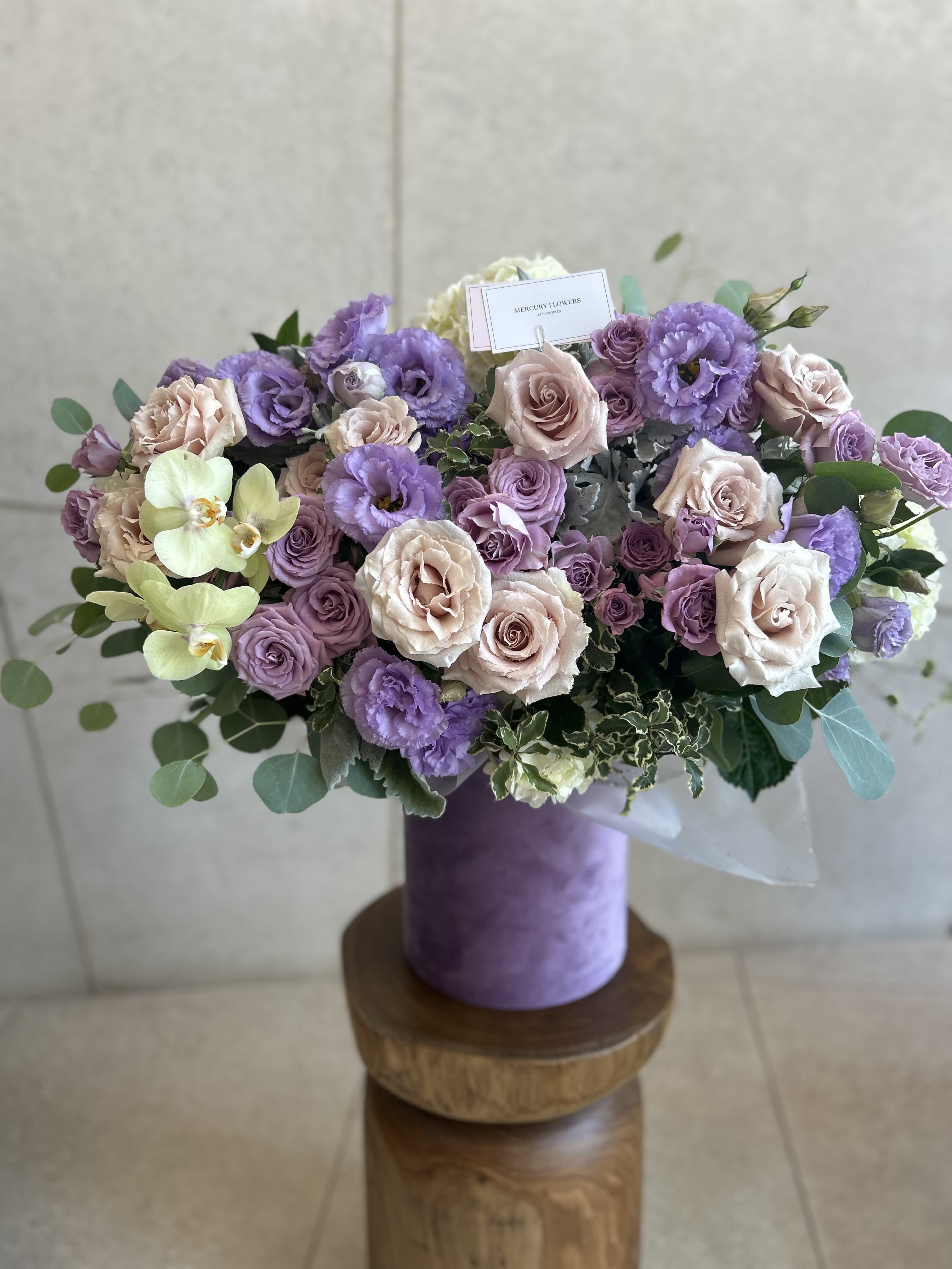Lavander bloom - Yellow ochids,lavander garden roses with blush roses in a beautiful lavander velvet box !