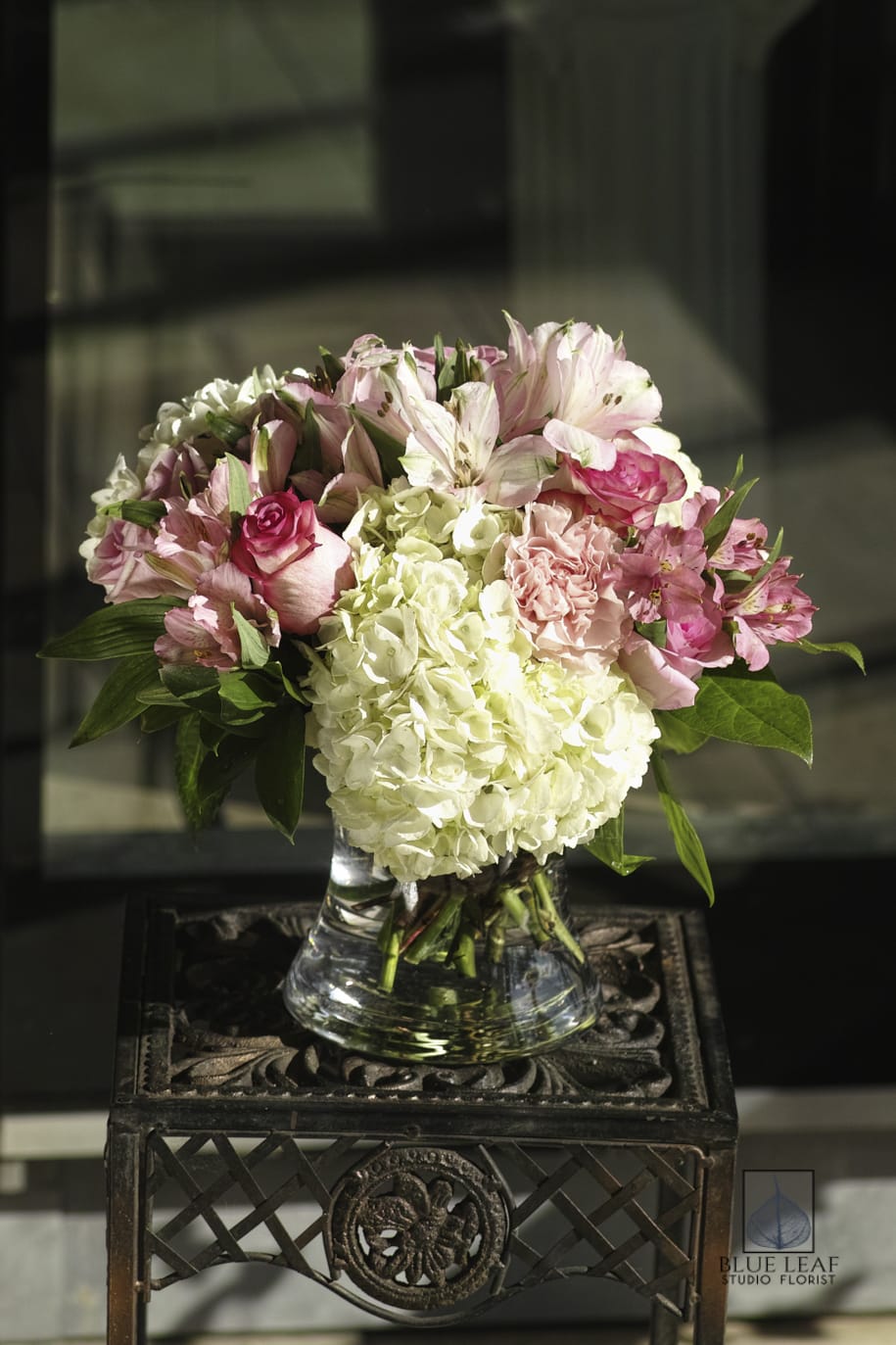 Pink Love Pink Love - A short and sweet arrangement of large white hydrangeas, pink alstromeria and roses.