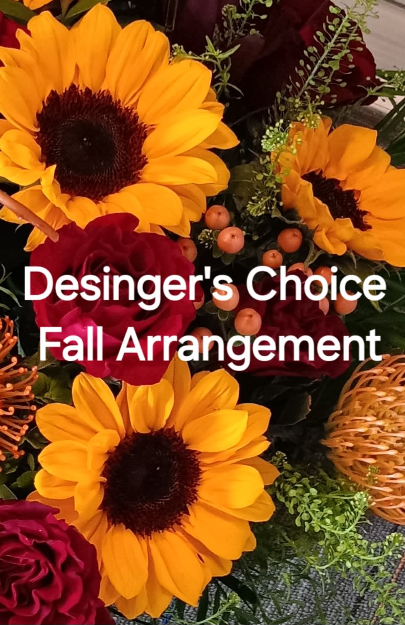 Designer's Choice Fall Arrangement Designer's Choice Fall Arrangement - Celebrate the Autumn season with a florist designed and arranged flowers.