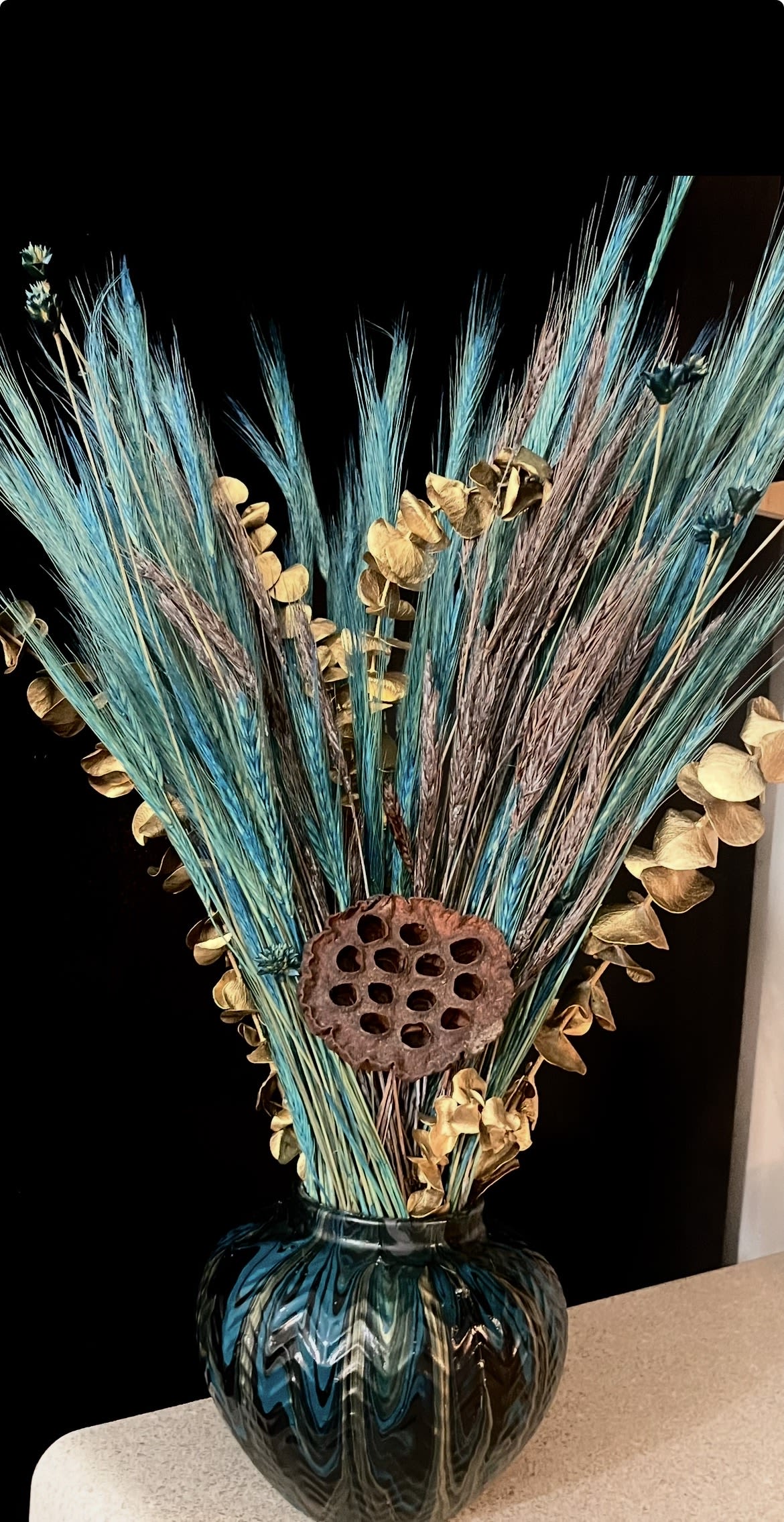 Crowned Peacock Shelly’s “Collector’s Edition Floral ArtPiece” - Bold. Purposeful. Refined  This Collector’s Edition statement piece by Shellice Clayborne embodies grace, elegance, and divine creativity.  This one-of-a-kind statement piece bridges my love for art and design — bringing balance, beauty, and spiritual depth into every space.  “Crowned Peacock” is a statement of elegance, confidence, and divine design. Created by artist and designer Shellice Clayborne, this exclusive arrangement combines a handcrafted acrylic vase with bold turquoise, black, and gold accents — colors that symbolize renewal, authority, and glory.  Each element is placed with purpose, reflecting harmony and strength through faith-inspired artistry. Designed as a statement piece for luxury interiors, foyers, or executive spaces, Crowned Peacock is not just décor — it’s a masterpiece that commands presence.   Size: Approx. 20-24”tall (customizable)  Material: Premium silk florals, gold accents, and artist-made acrylic vase  Availability: One-of-one design — made to order upon request  Together, they speak of transformation — the beauty that happens when God breathes purpose into my creativity 