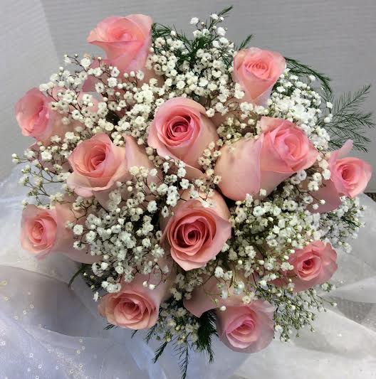 Prom BVP8 - Dozen Rose Handheld Bouquet - One dozen roses designed with baby's breath and greenery. Please call for additional color options.
