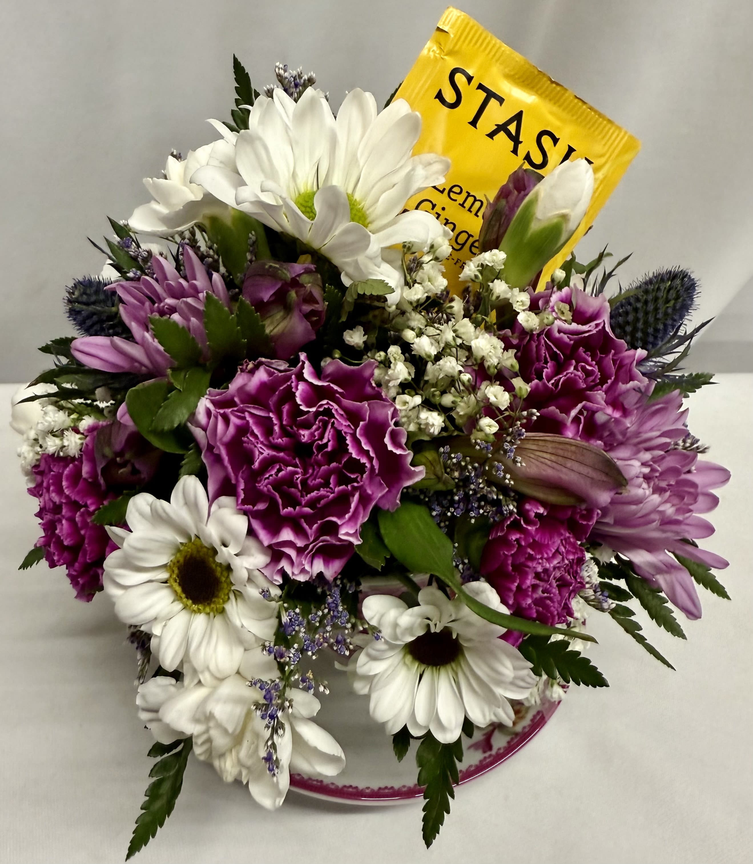 Tea party! - Surprise her with a Keepsake floral tea cup and saucer filled with colorful blooms! styles vary also comes with a tea bag