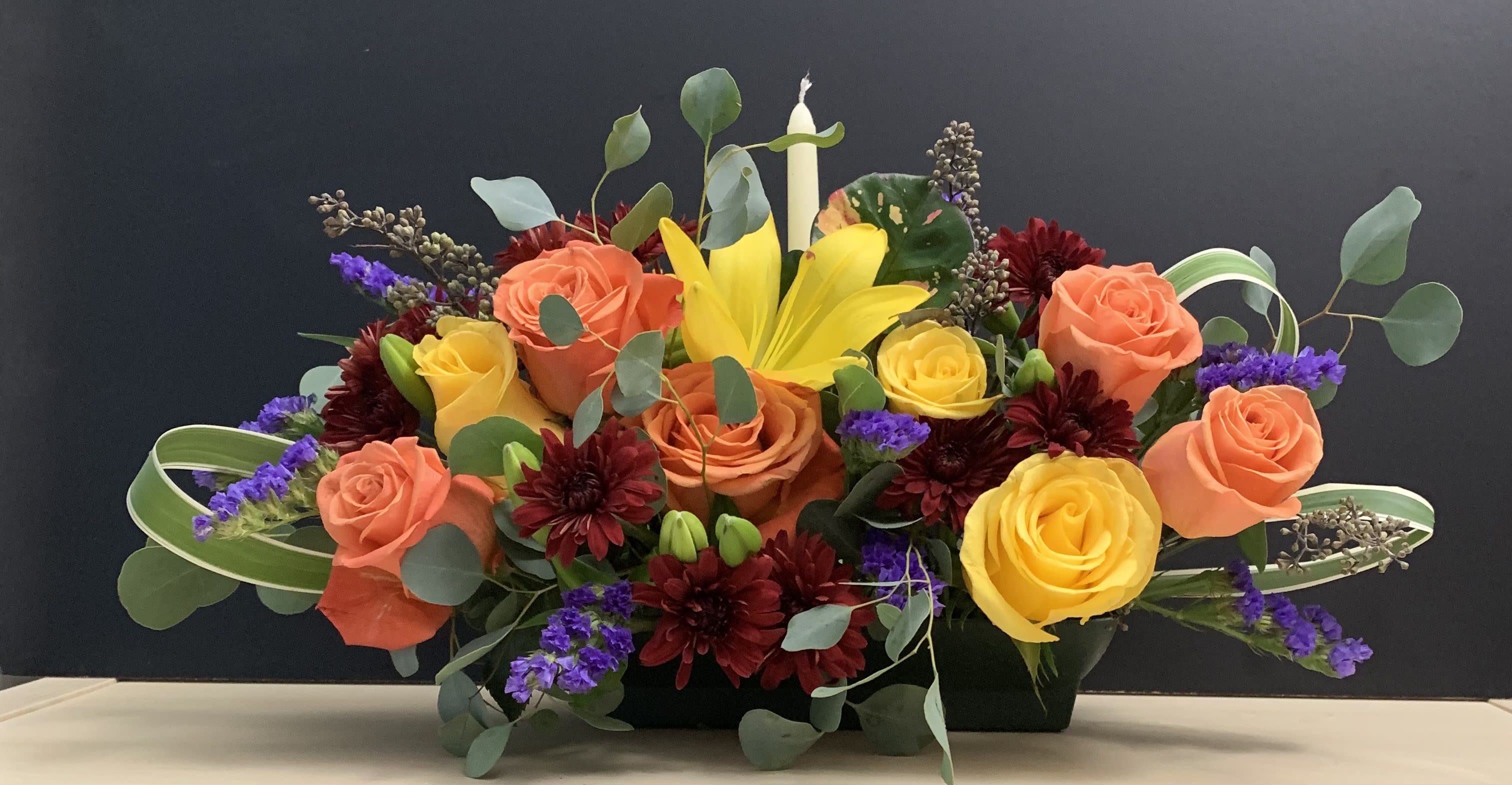 Feel Vibration  - Mixed color Roses, Lilies, filler, green. 