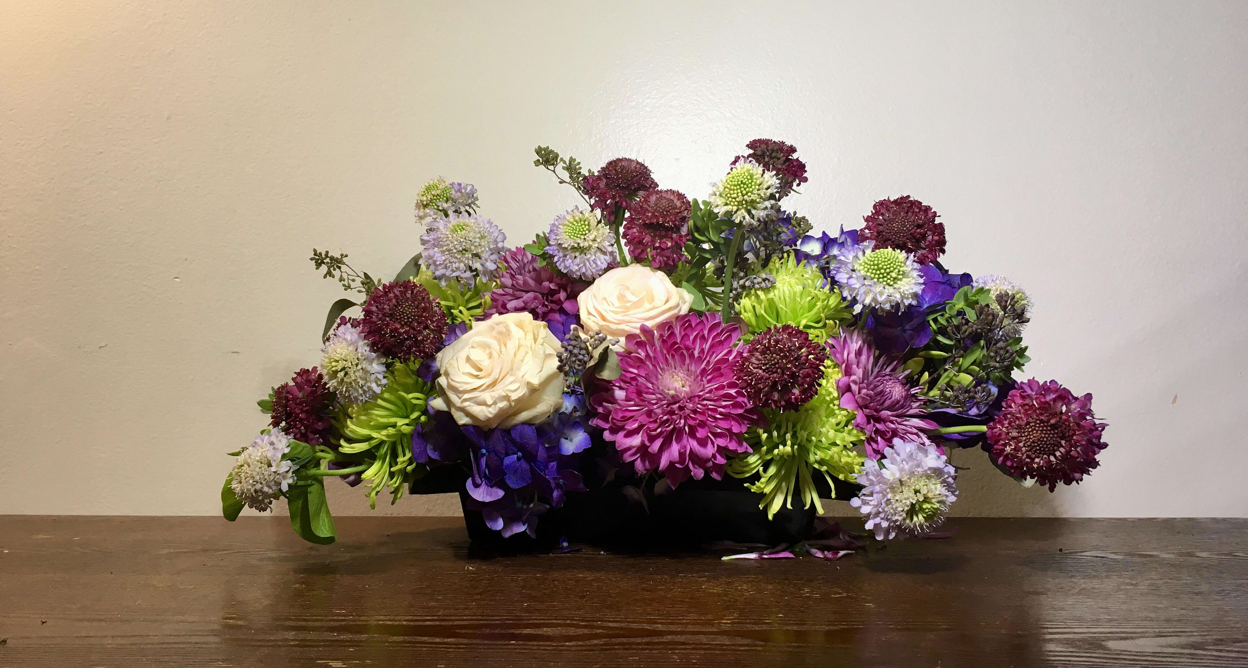 Fall Wind - Mixed Flowers in ceramic black container