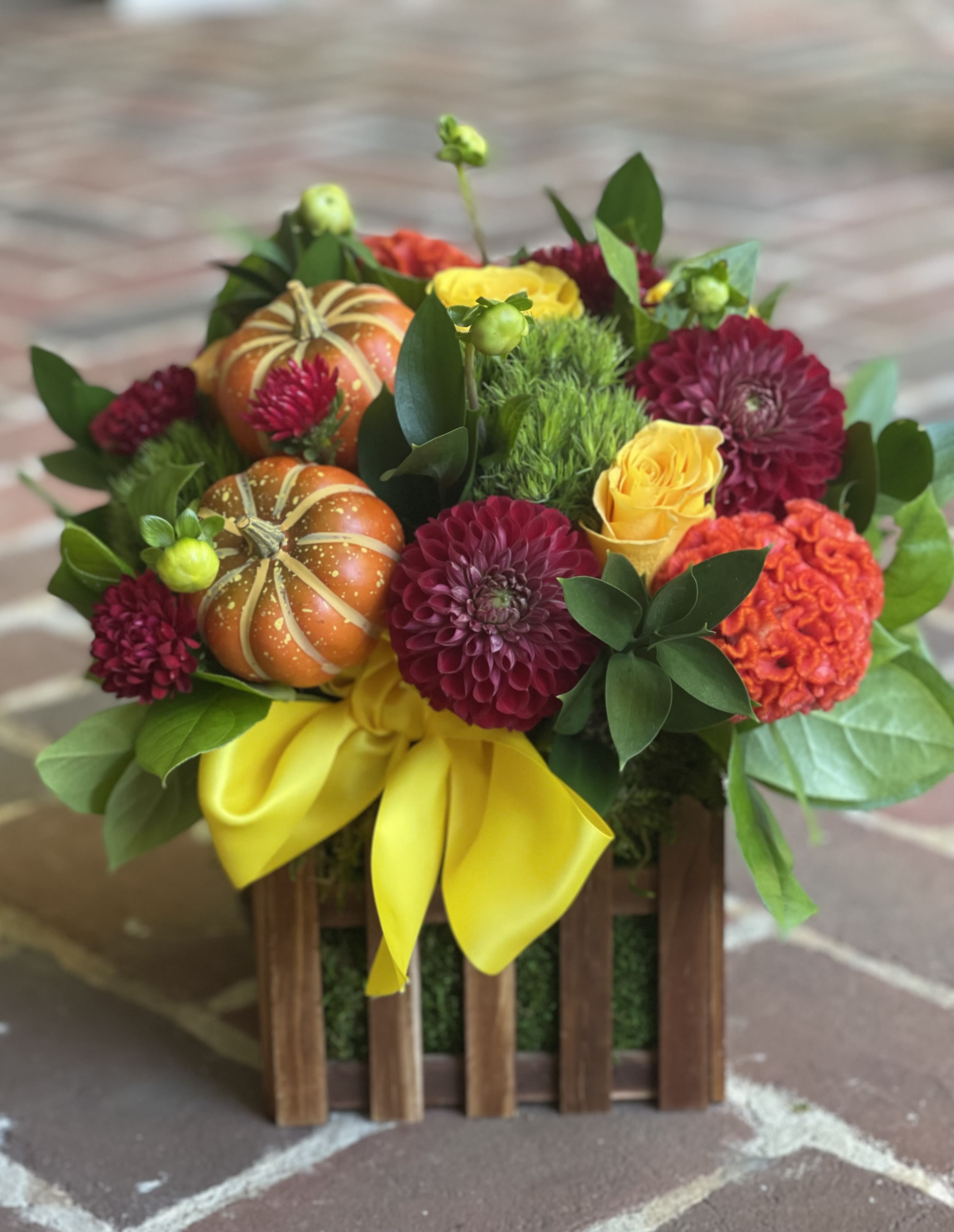Fall Picket Fence Fall Picket Fence - A sweet fall arrangement perfect for any occassion. Tax free, same day hand delivery. We are a local florist in Wilmington, Delaware that delivers fresh flowers on the same day for delivery near you. Our flower shop services the Wilmington and Newark Delaware areas. We are a flower shop near you that is tax free and provides hand delivered flowers. We offer sympathy flowers and are a full service florist that offers online flowers and fresh flower arrangements. You can send flowers from our flower shop to Wilmington, New Castle, Newark, Hockessin, Chadds Ford, Kennett Square and other local cities near us.